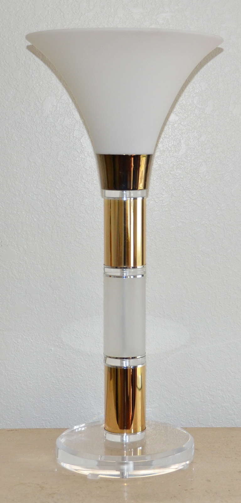 This is a large cool wonderful midcentury 1960s modern clear and frosted Lucite and brass banded Lamp torchiere with a frosted urn shape glass shade and clear Lucite base-

A very solid construction and nicely detailed. It creates a bright glowing