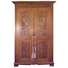 Scottish Oak Armoire with Superb Fantastical Carvings- Audaces, Fortuna, Juve