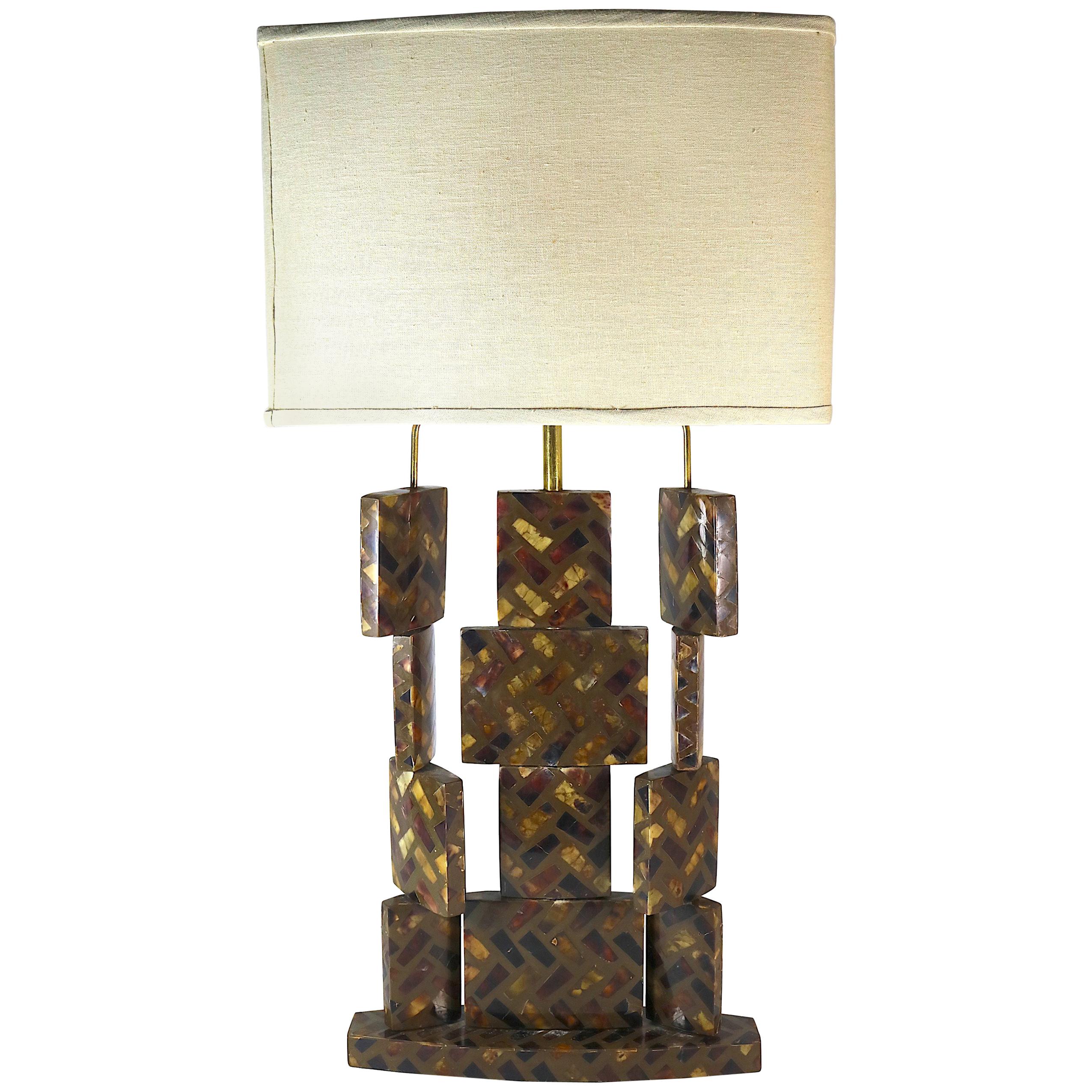 A rare stylish modern rare R & Y Augousti Paris authentic Tesellated Horn table lamp.
The French lamp combines glamour and modernism in its form and use of exotic tessellated Horn set in lacquer and brass-
exotic materials as is a trademark of the