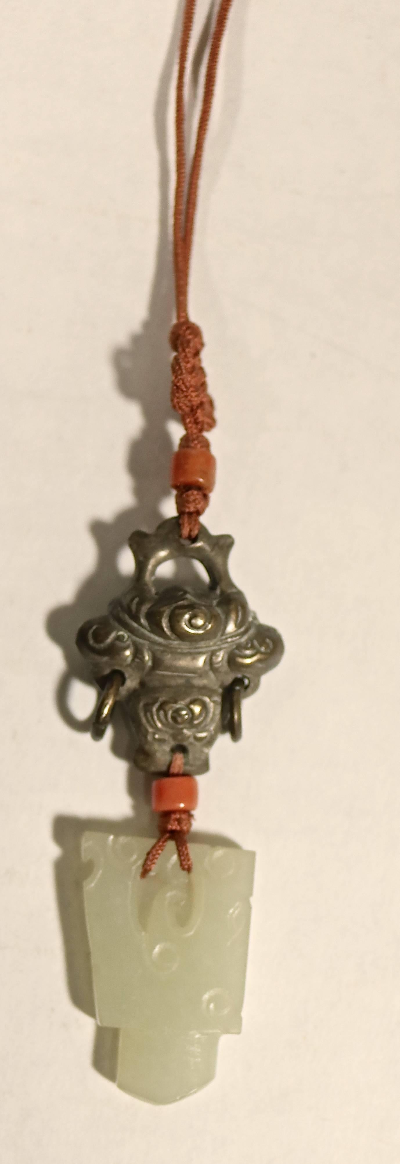 Rare 18th century Chinese coral beads, carved double sided jade drop, puffy double-sided repoussé urn shaped silver pendant with side rings on silk knotted cord-              6 1/2