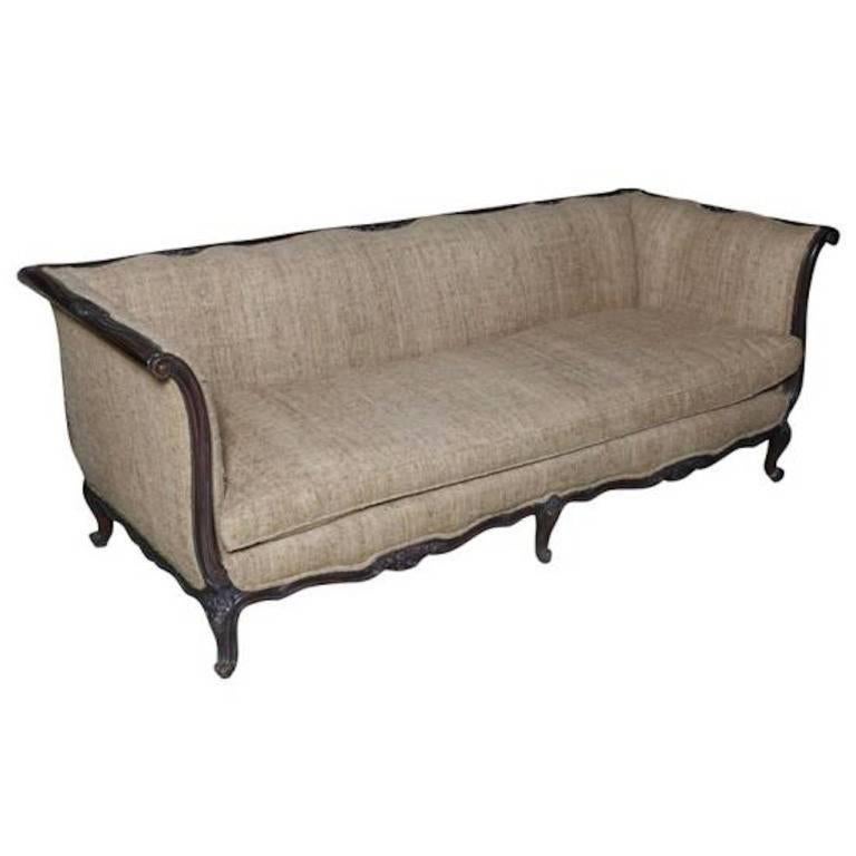 French  stylish sofa- A chic blend of a traditional eloquently hand-carved rich walnut frame with refined details upholstered in a luxurious natural raw tussah silk upholstery. The styling combines Luxury Quality upholstered tight back with a down