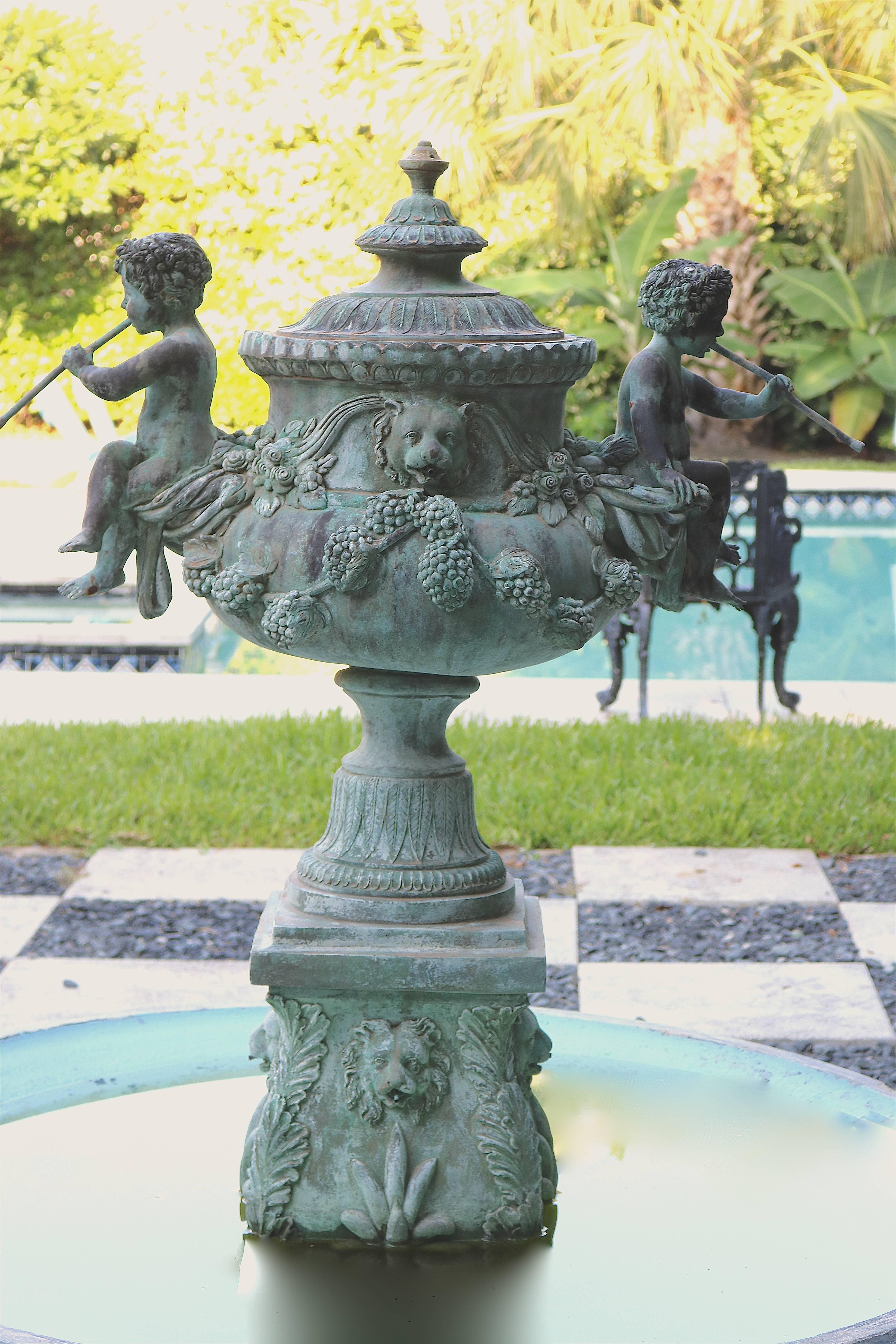 Bronze Fabulous Neoclassic Vintage Bronze Fountain. 
Highest quality and great presence with an aged weathered beautiful Verdigris patina. The water cascades from three levels, into the basin. 1st level at the finial and top, 2nd level flutes and