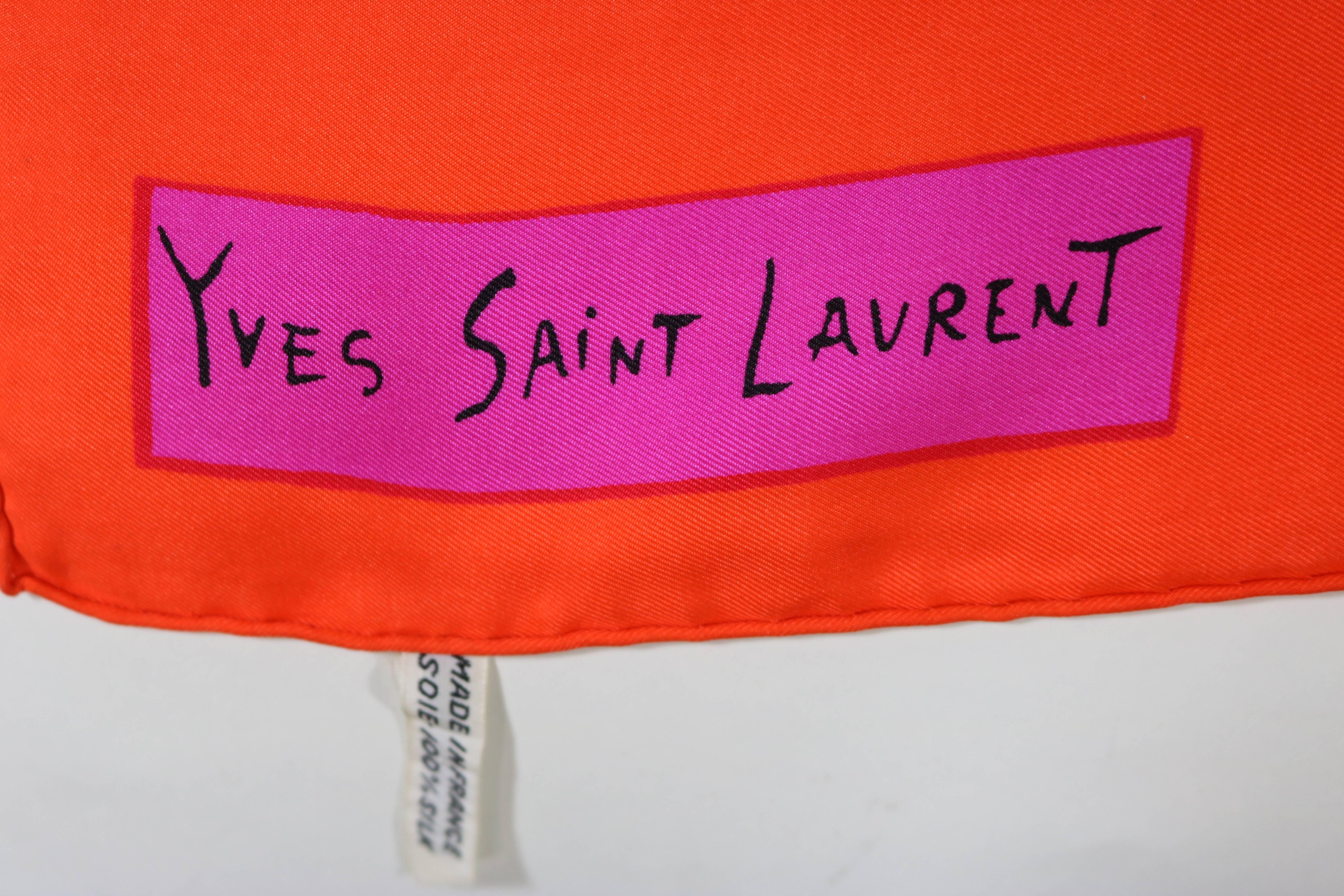 1960s Lucious Yves Saint Laurent's bold orange and hot pink, right on today's trend- of day-glo bright colorful clothing ---geometric silk scarf with hand-rolled finished edges. Measures: 32