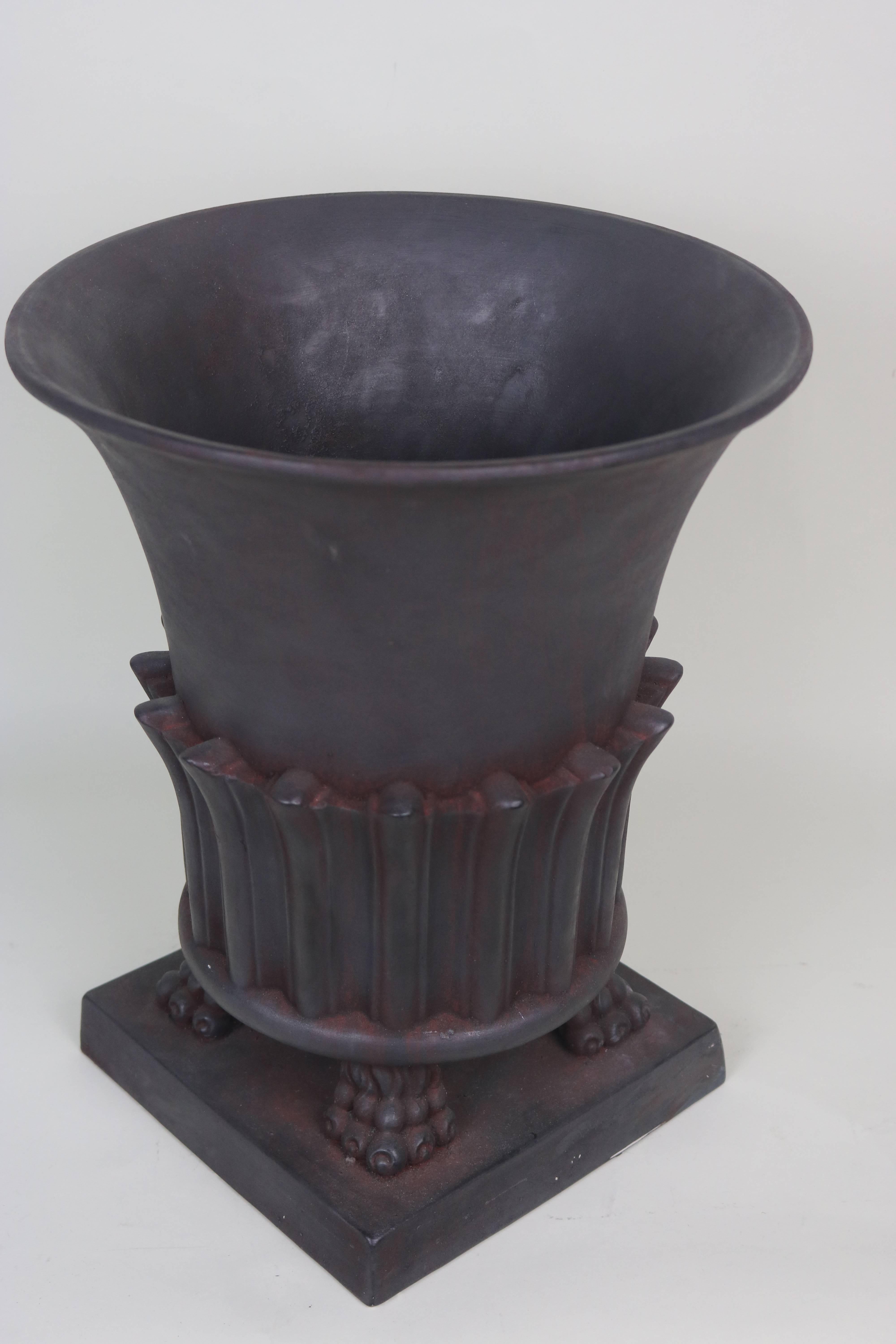An impressive power urn for an eclectic or modern interior!
1950s  Classical Greco-Roman style urn-Terra Cotta bisque matte black finish with rusticated undercoat- this elegant urn features paw feet and nicely defined classical details.
Very large