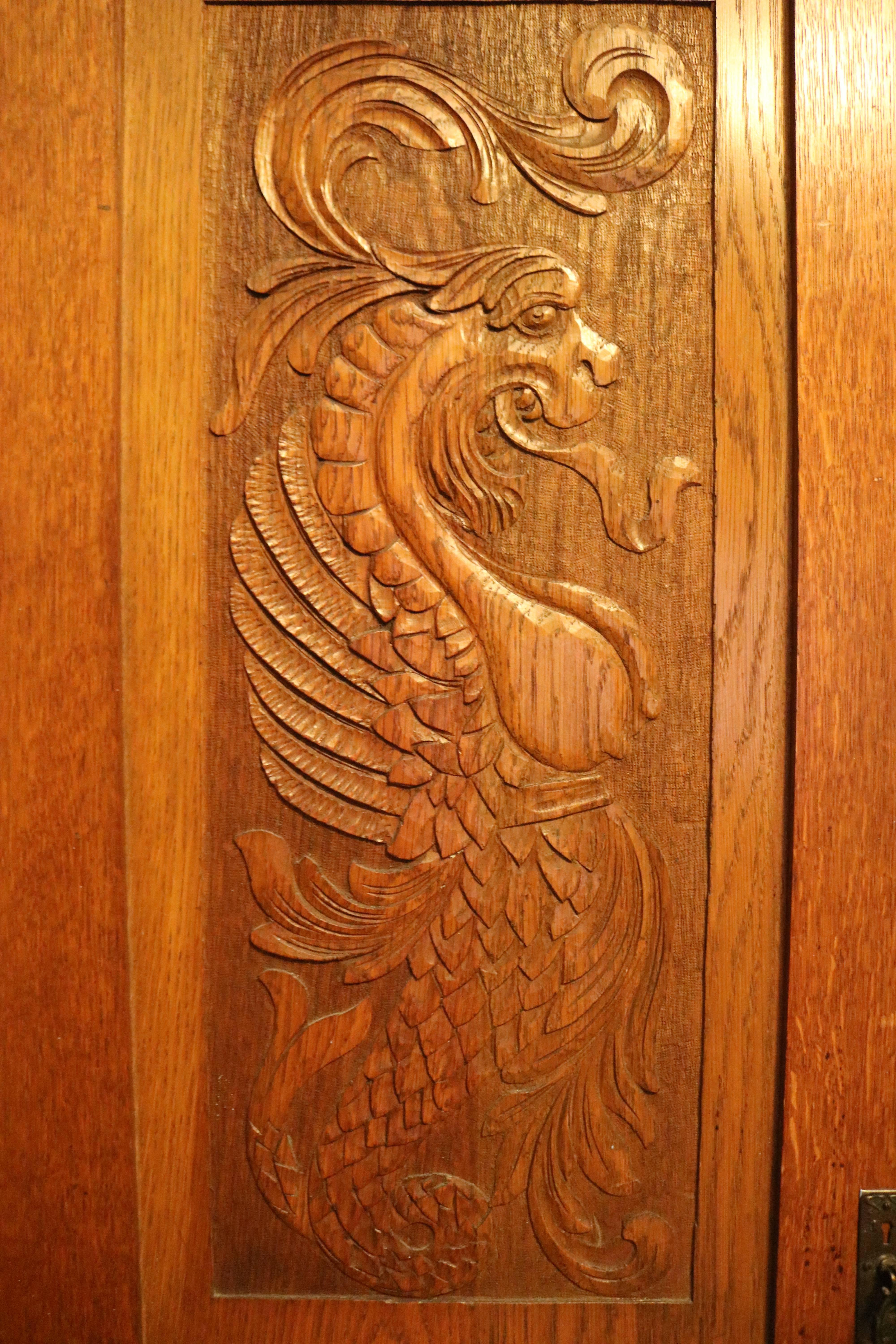 Scottish Oak Armoire with Superb Fantastical Carvings.Audaces.Fortuna.Juve In Good Condition For Sale In West Palm Beach, FL