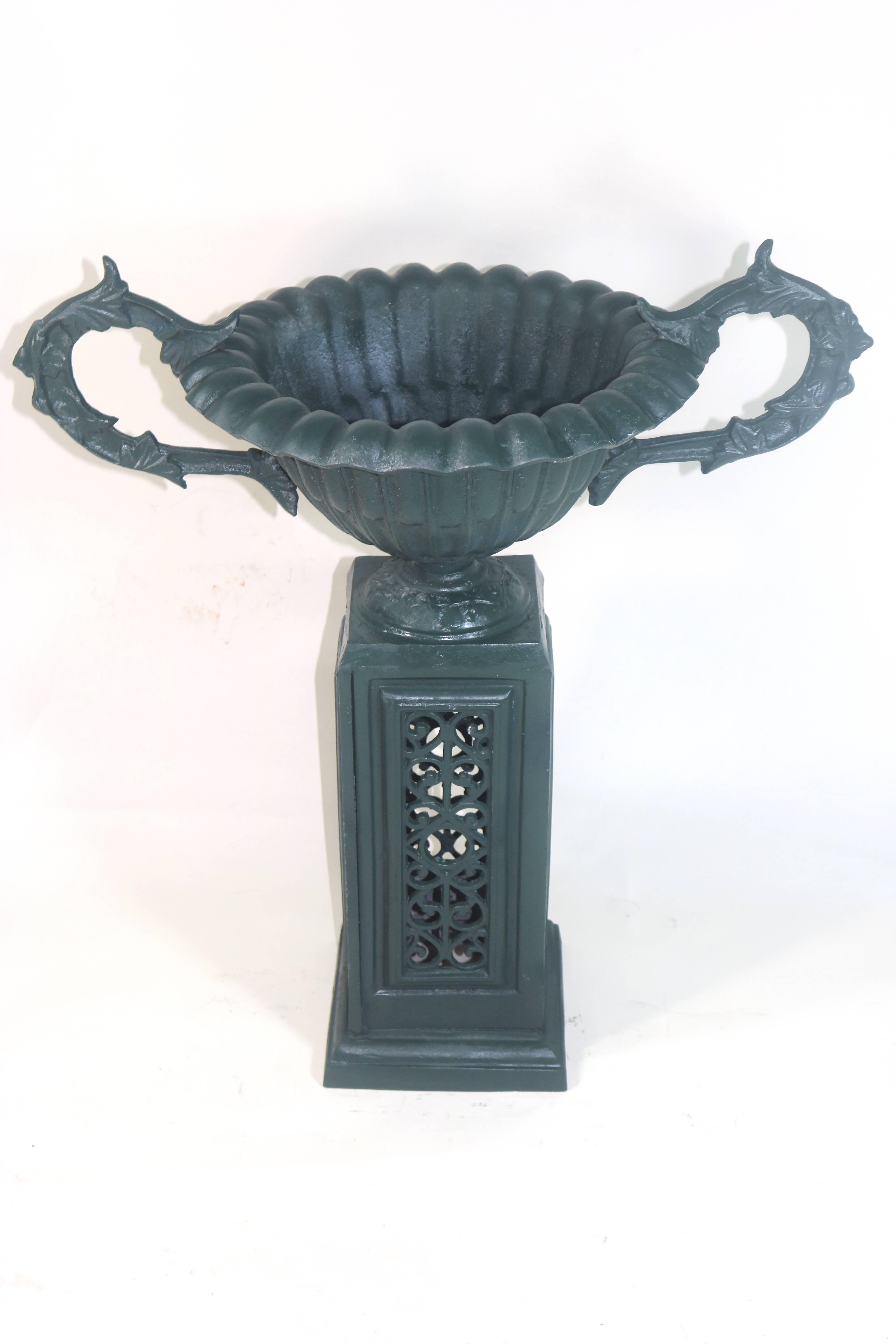 Elegant Victorian urn planter fabricated of finely cast metal. Attributed to J.W. Fiske and Company, the premier fabricator of cast metal urns, furniture, and statuary-several are in the historic White House Rose Garden.
A pair of large nicely
