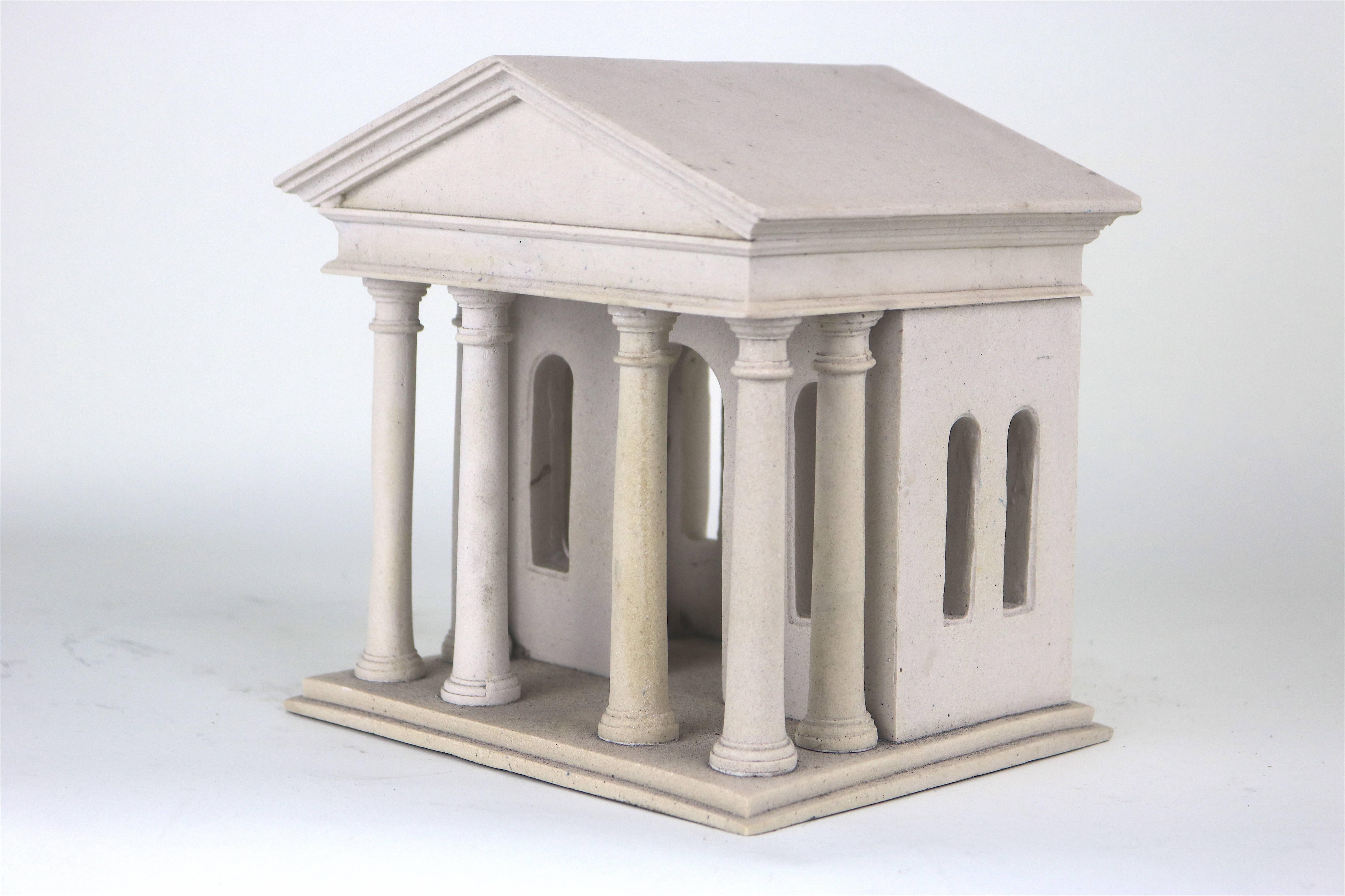 A wonderful composition model of a Greek temple. 

The Greek temples consisted of the Cella, a plain room-the seat of the god, which was normally left empty except for an image, and a room at back designated as the treasury. Small temples were