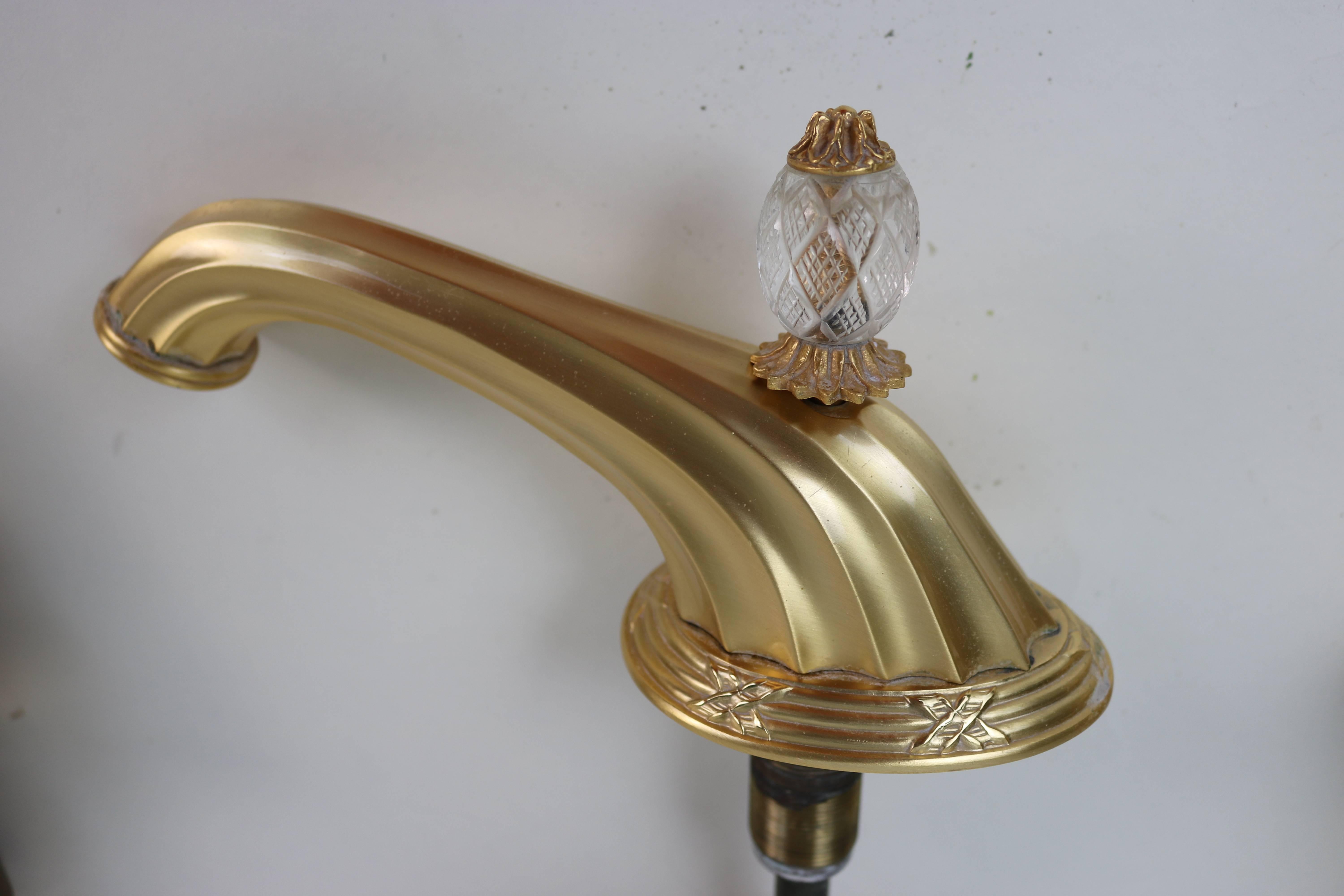 Gorgeous 22-karat Gold Plate 1960s vintage Sherle Wagner ribbon and reed sink faucet set is a Sherle Wagner Classic. The older set as this have a heavier gold plate finish then those today.
Sherle Wagner Hardware has graced the homes of discerning