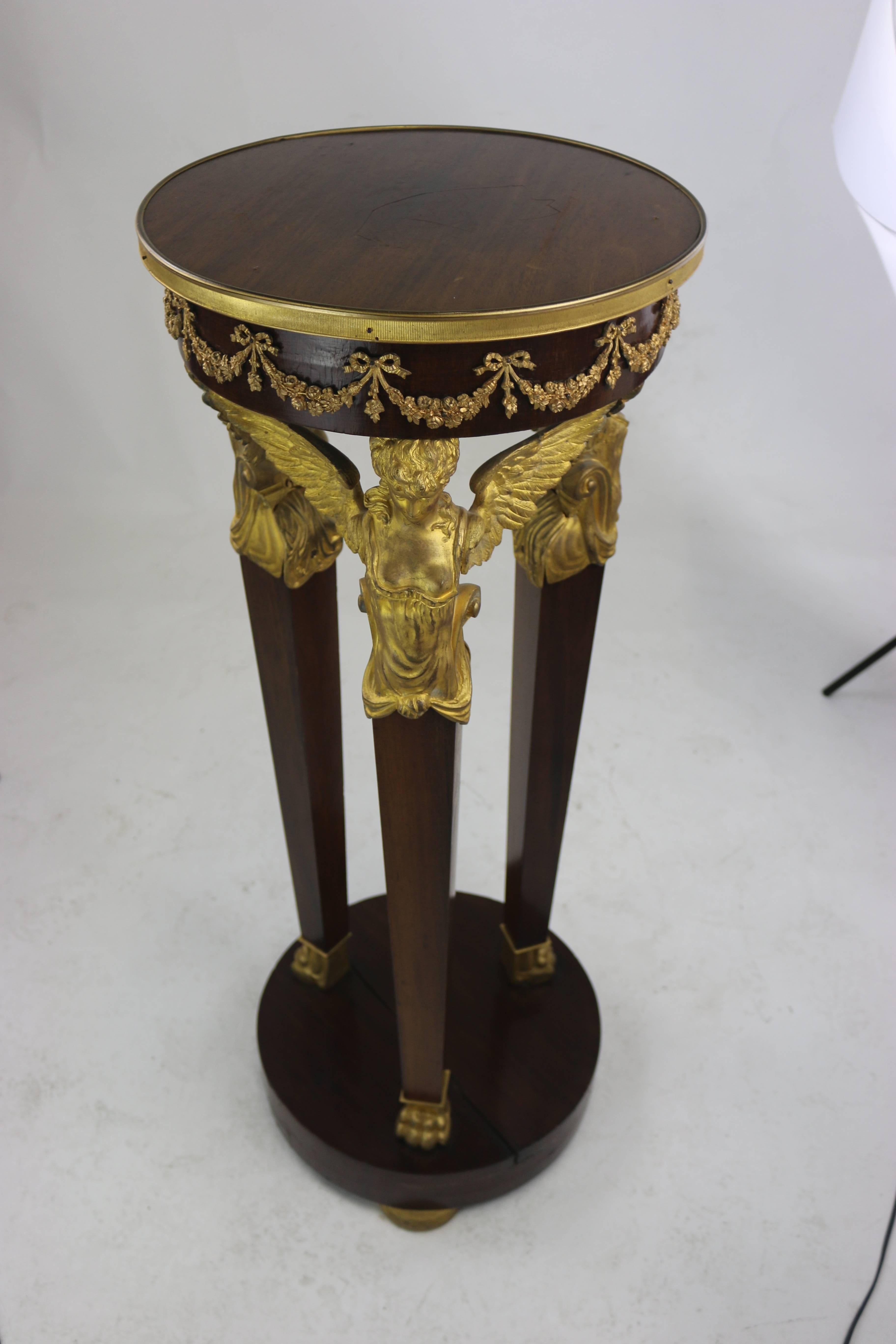 If you wish a Royal environment, this is a great beginning,
circa 1798-1830 French Empire period gilt mahogany pedestal, neoclassic gilt garlands around the apron, gilt winged caryatid terms, gilt lion paws, gilt bun feet.
Embodying luxury and