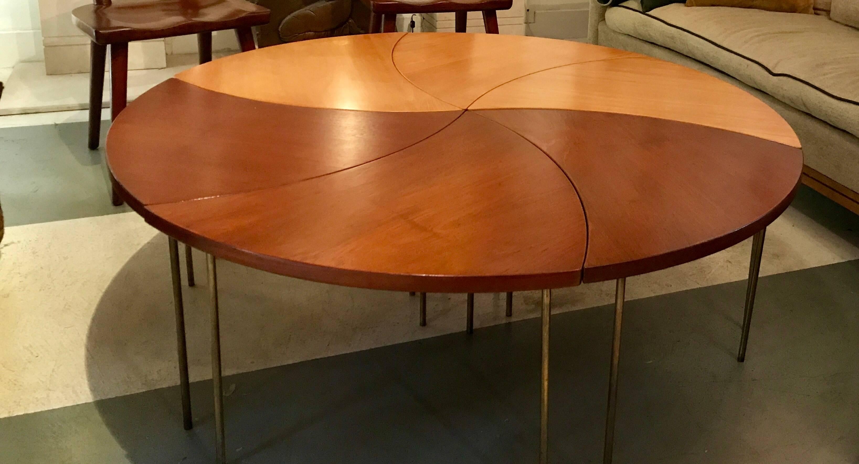 A Mid-Century Modern private commission unique edition by my architect father from John Stuart International in 1950. This one and only 2-tone uniquely colored veneers in half light and half dark teak wood-6 individual Tables which create a large