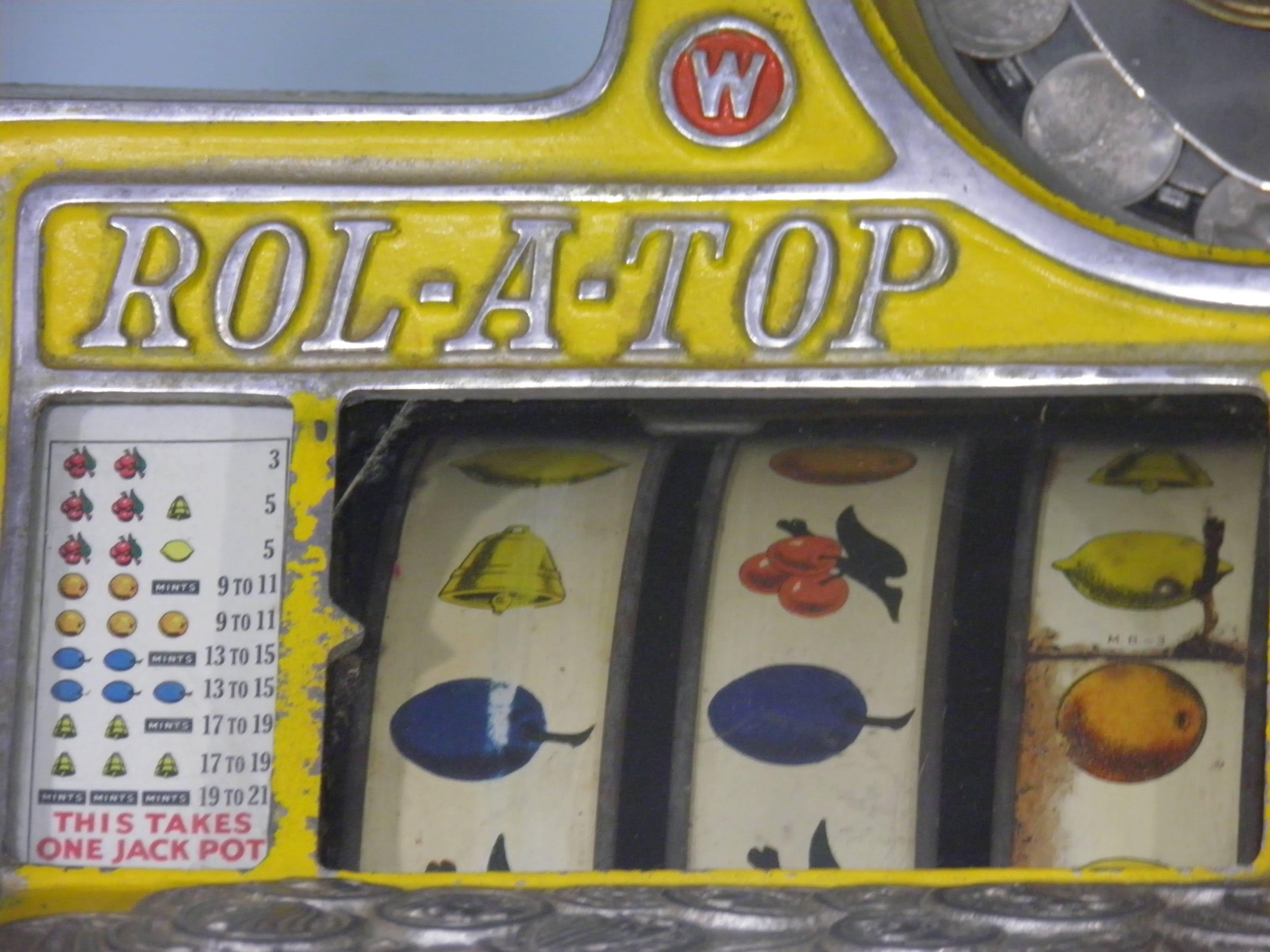 Hollywood Regency Antique Slot Machine Watling Coin Front Rol-A-Top with Eagle Motif For Sale