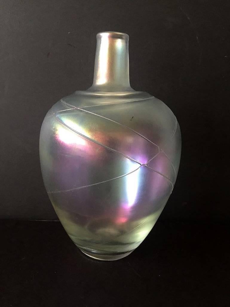 Iridescent large handblown art glass vase with raised design and thumb print by well-known vintage Swedish Glassworks Boda (now known under the name Kosta Boda). The vase is by Bertil Vallien from the 1950s-1960s. It has lovely iridescent hues of
