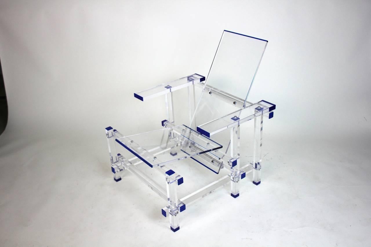 An inspirational power chair for a chic modernist, the only one fabricated like this by the superb craftsman.
Functional art, a beautifully designed and executed American clear transparent Lucite, plexiglass, acrylic  Lounge Chair with blue Lucite