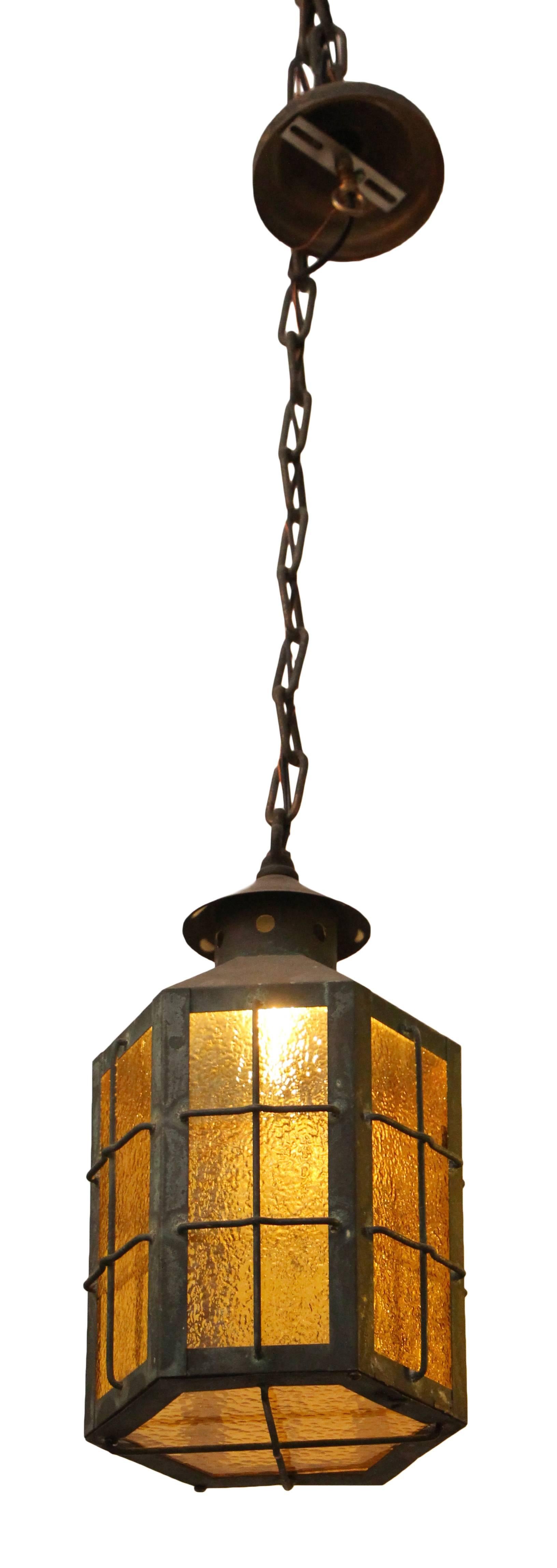 American 1930s Pair of Outdoor Copper Pendant Lanterns with Textured Amber Glass