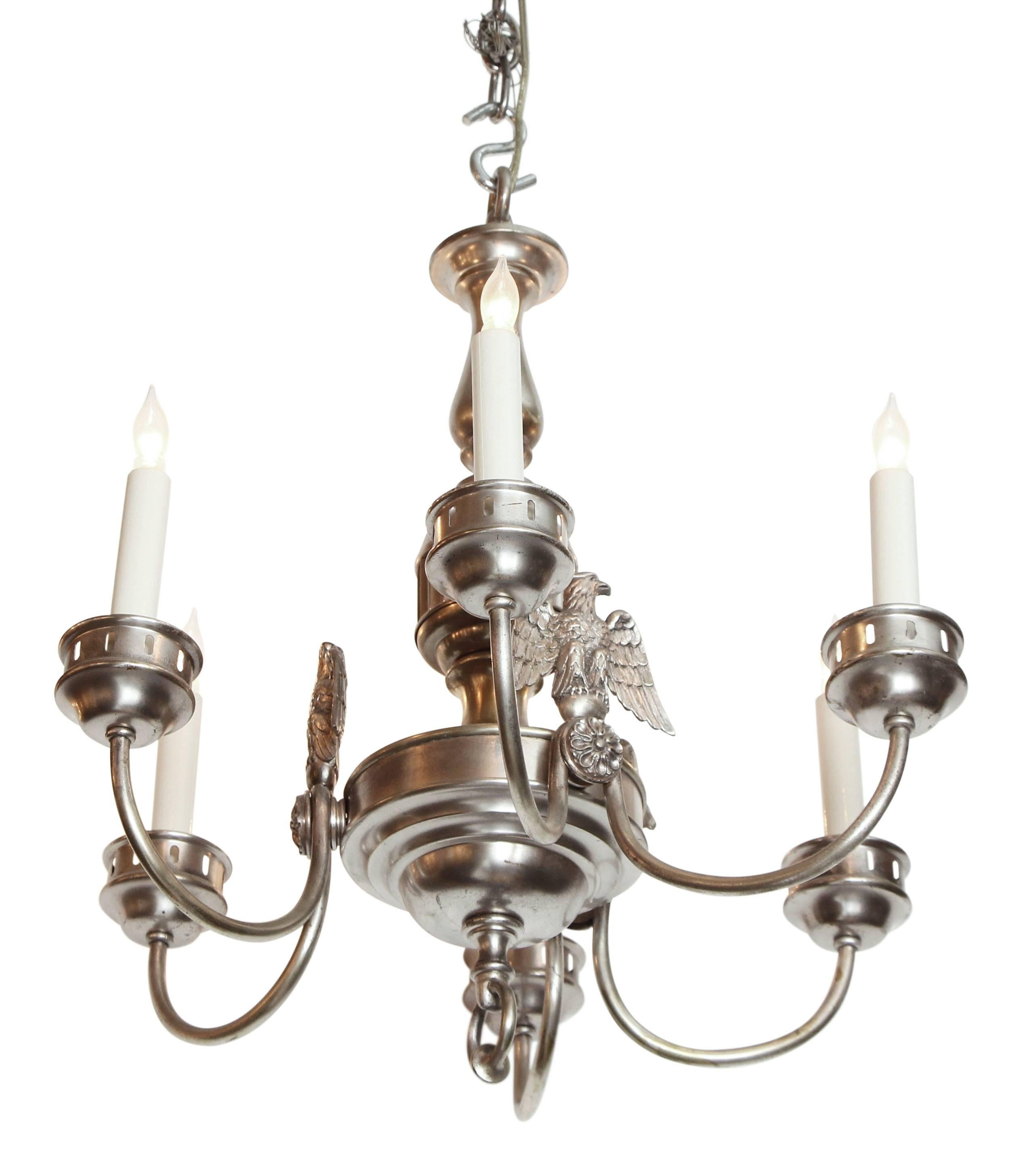 Silvered bronze six light hanging fixture by the Sterling Bronze Co. of New York. The chandelier is from 1900s. Done in a Federal style with three eagles presented between the arms. This item can be viewed at our 5 East 16th St Union Square location