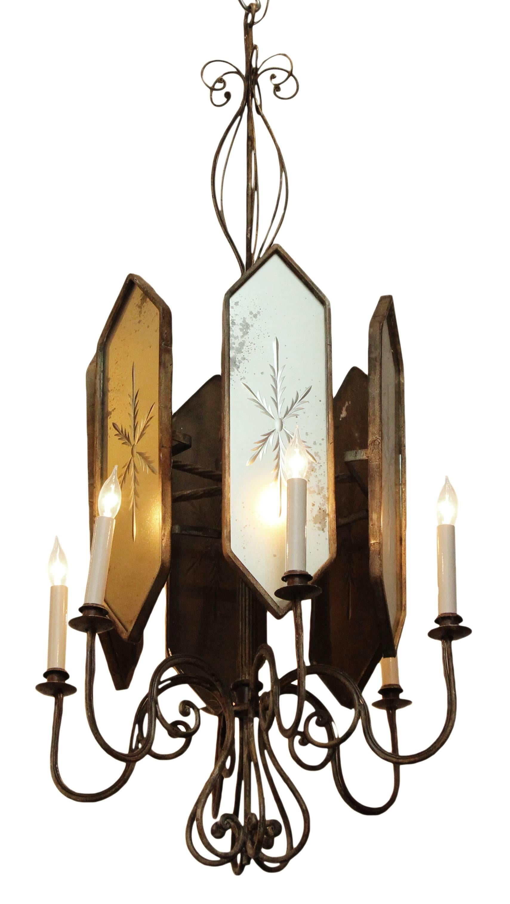 Venetian style Art Deco six-arm chandelier. This piece is fashioned out of wrought iron with etched mirrored glass. French made in the 1930s. This item can be viewed at our Union Square NYC location.