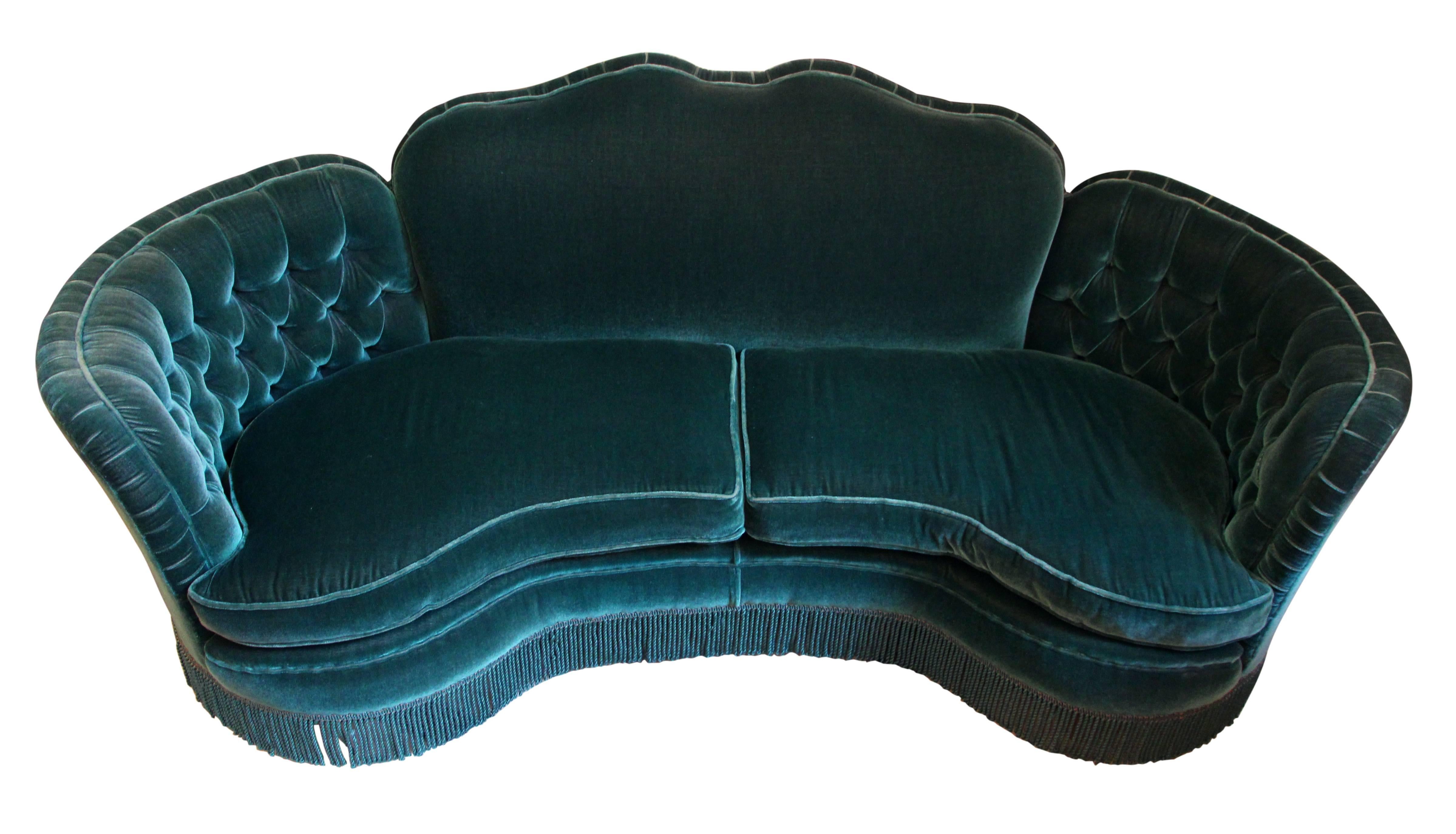 1951 emerald green tufted curved original mohair sofa in overall excellent condition, with a small rip in the backside. Stayed in an unused sitting room for 66 years. Custom-made in northeast PA. This item can be viewed at our 5 East 16th St, Union