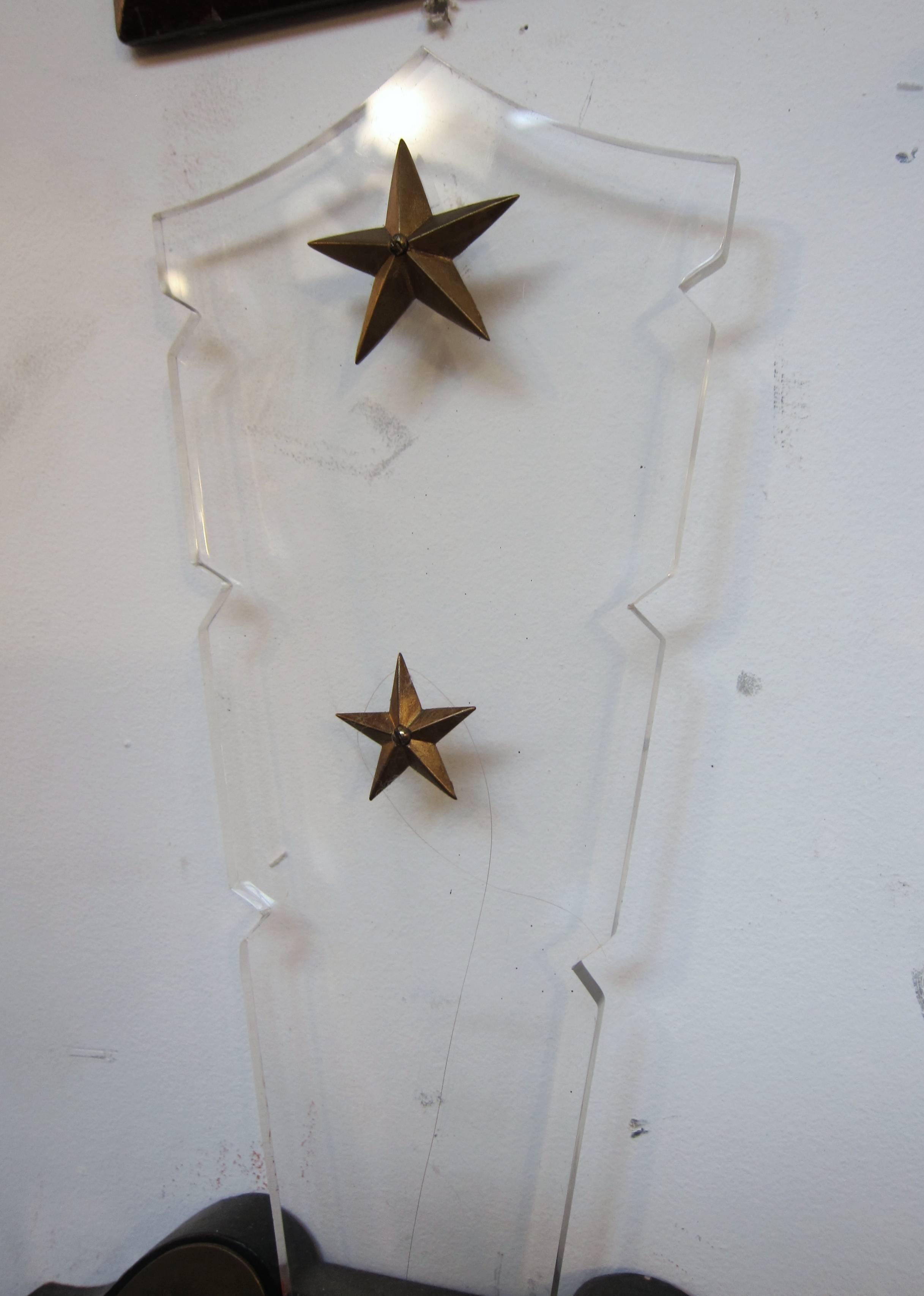 1940s pair of French Art Deco sconces with gilt, plexiglas and applied stars.
These can be viewed at our 5 East 16th Street Union Square location.