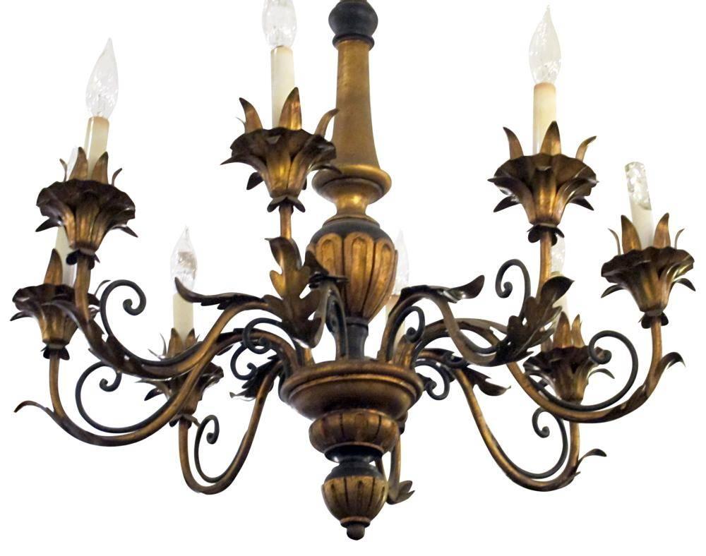 Florentine style wood chandelier with gilt metal and eight arms. Made in the 1930s. This item can be viewed at our 5 East 16th St, Union Square location in Manhattan.
