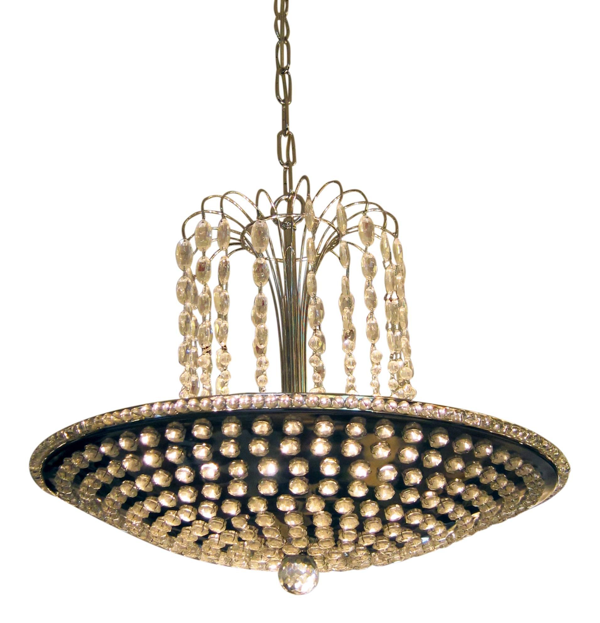 Pendant light featuring cascading teardrop crystals coming off the center stem. Shown in a nickel finish. This item can be viewed at our 5 East 16th St, Union Square location in Manhattan.