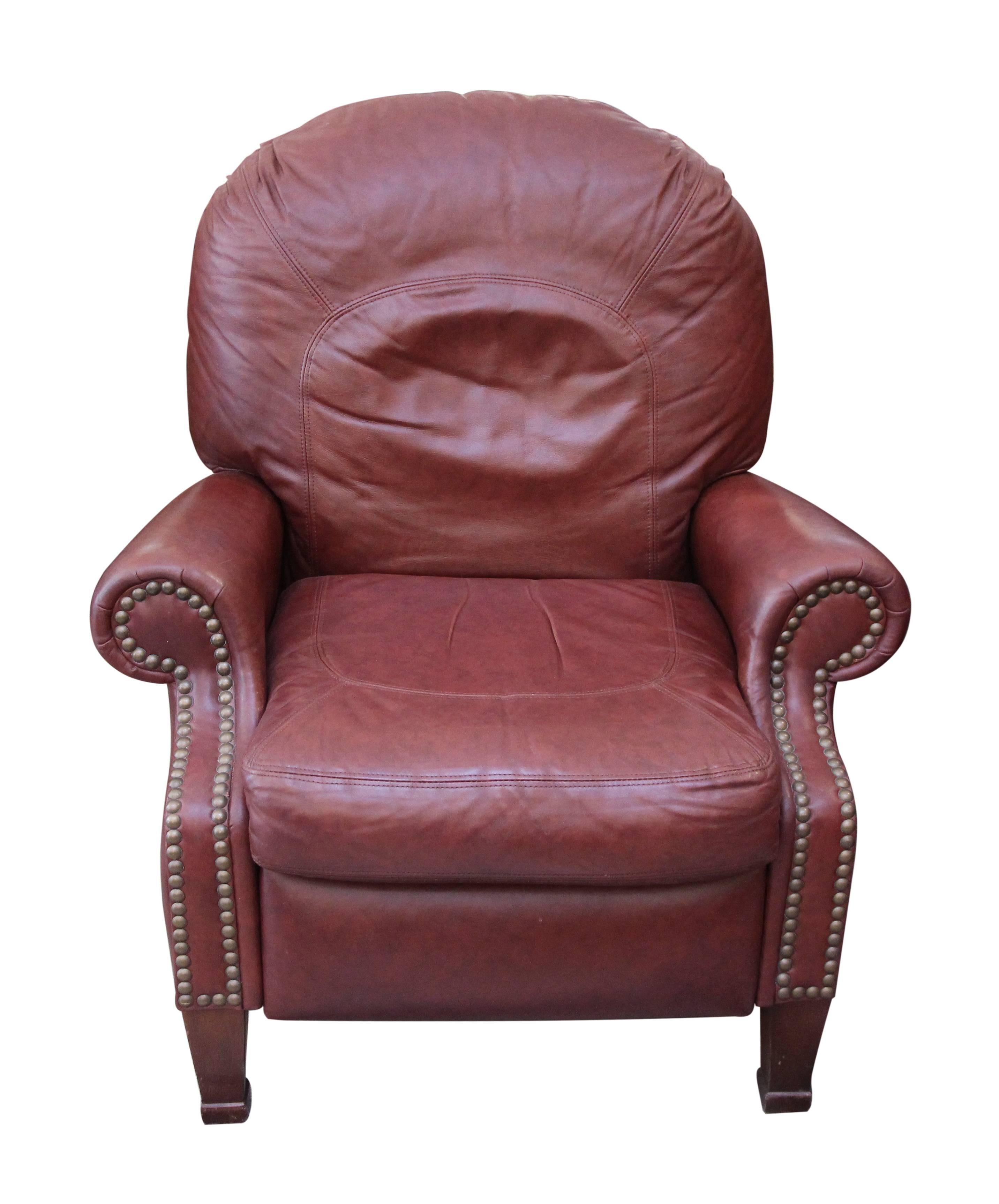 2000s pair of burgundy leather reclining chairs made by Bradington Young. This item can be viewed at our 5 East 16th St, Union Square location in Manhattan.