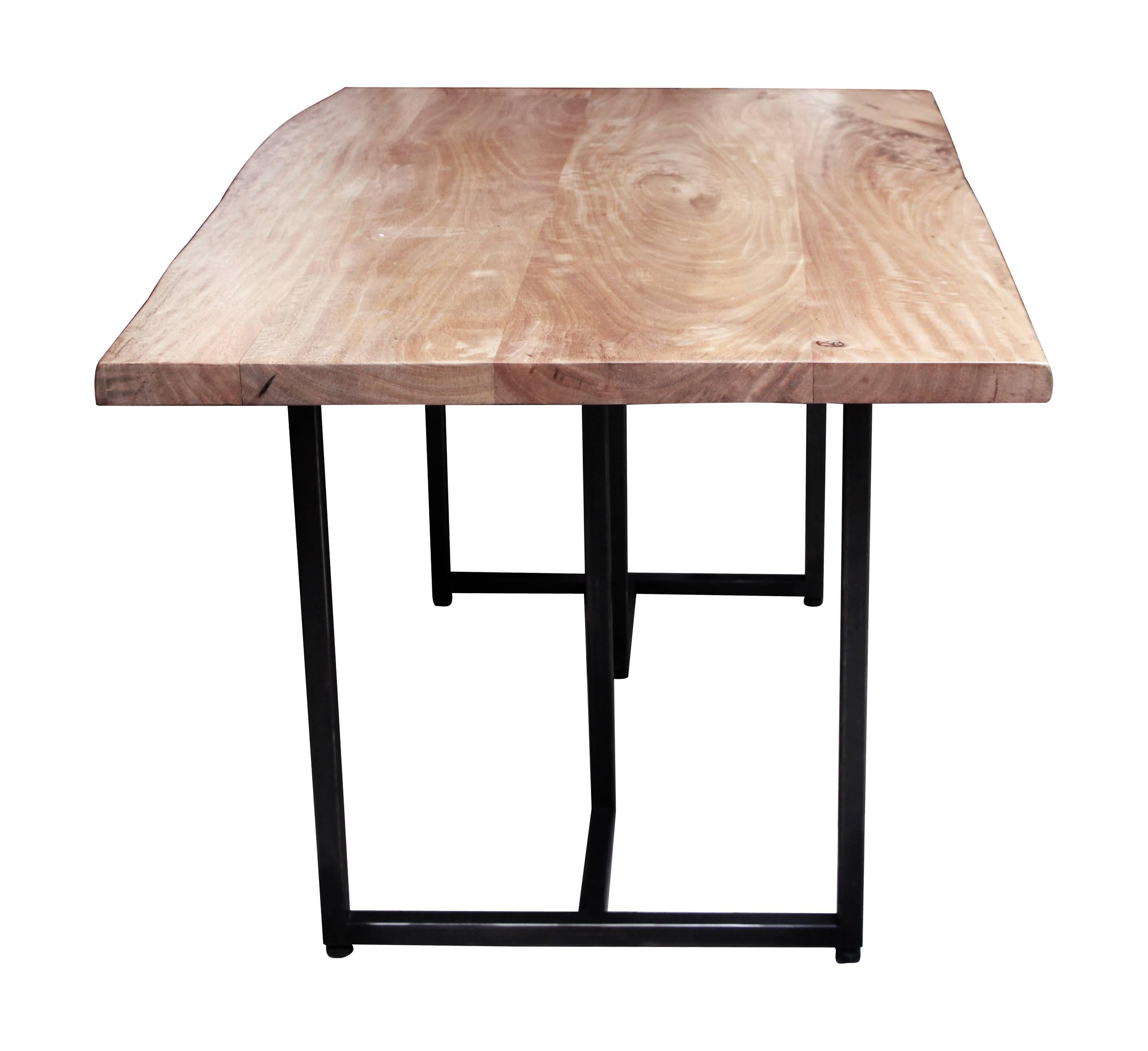 Live edge walnut table with Mid-Century Modern style black steel legs. We have several other leg styles to choose from. 
Please note each table is custom built and therefore each table varies slightly due to the natural grain of the wood. Other