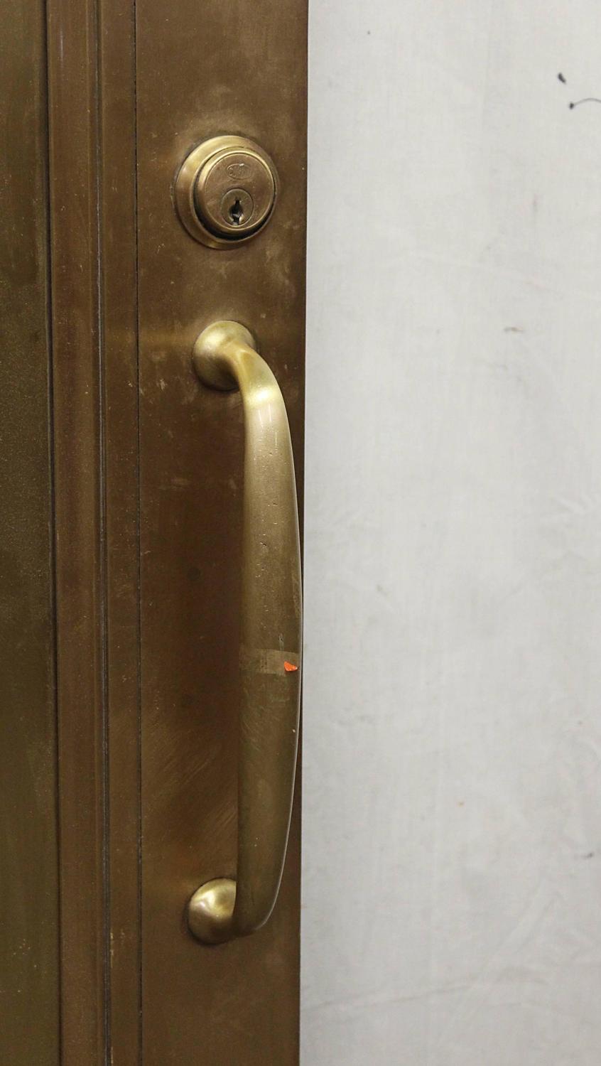 1920s Brass Lobby Door with Wood Veneer on One Side and Original Hardware For Sale at 1stdibs