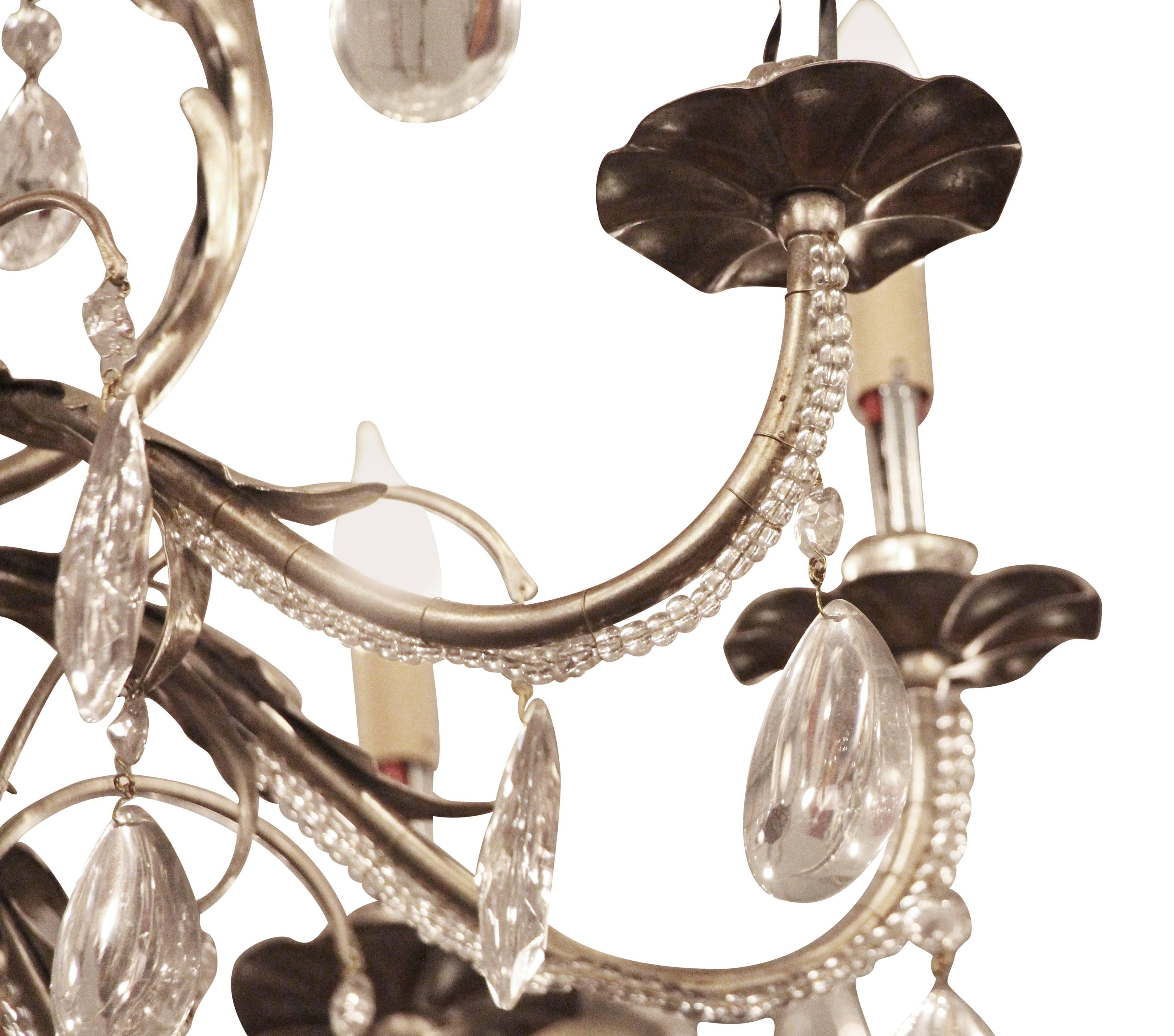 Contemporary 2005 Florentine Style Steel and Crystal Chandelier with Nine Arms