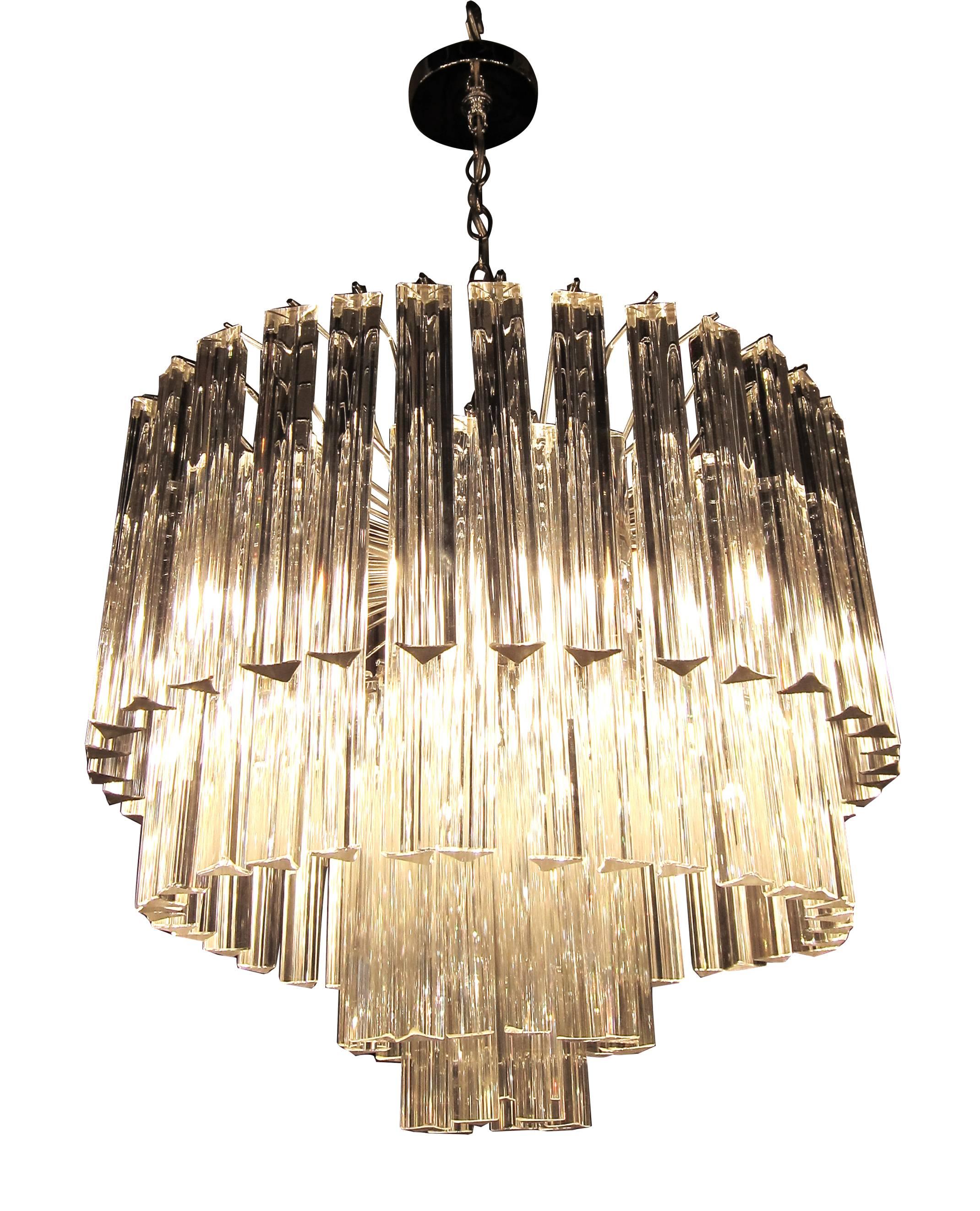 1960s Mid-Century Modern nickeled Venini four-tier crystal chandelier. This item can be viewed at our 149 Madison Avenue location in Manhattan.