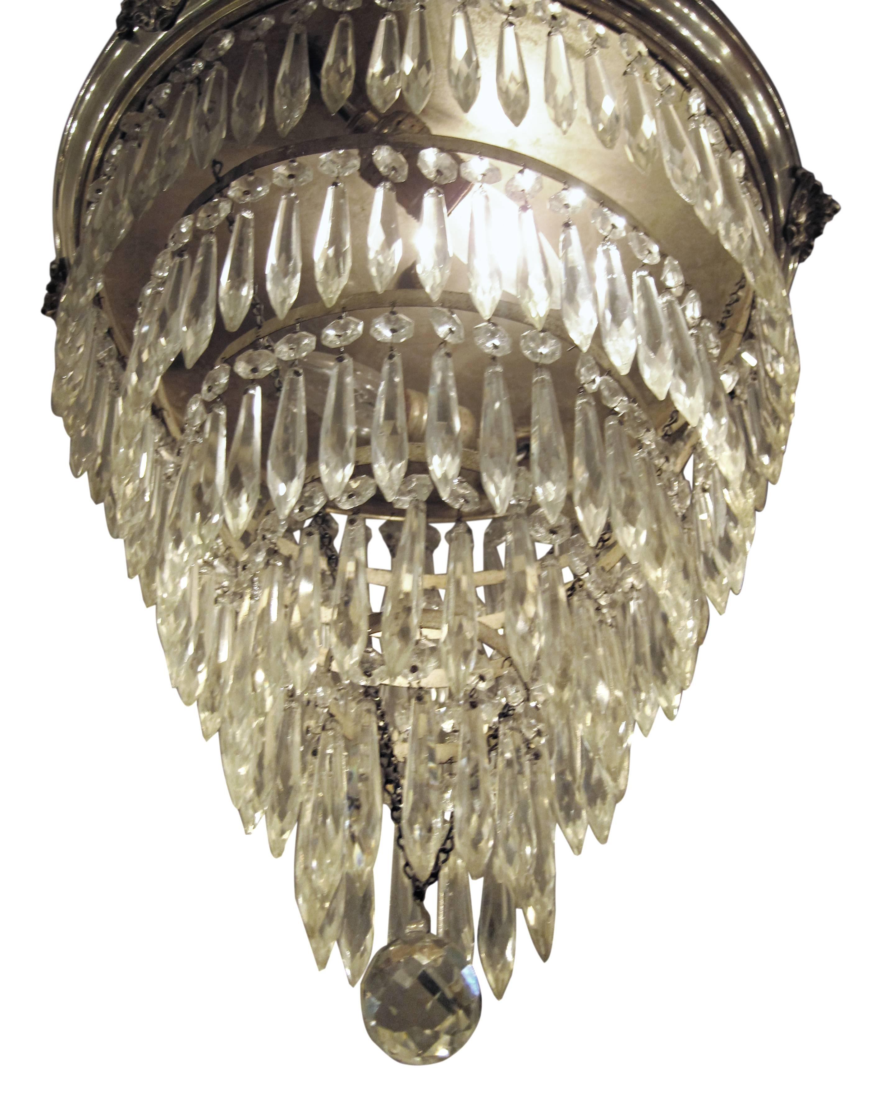 1920s silver plated crystal wedding cake flush mount chandelier with five tiers. This item can be viewed at our 149 Madison Avenue location in Manhattan.