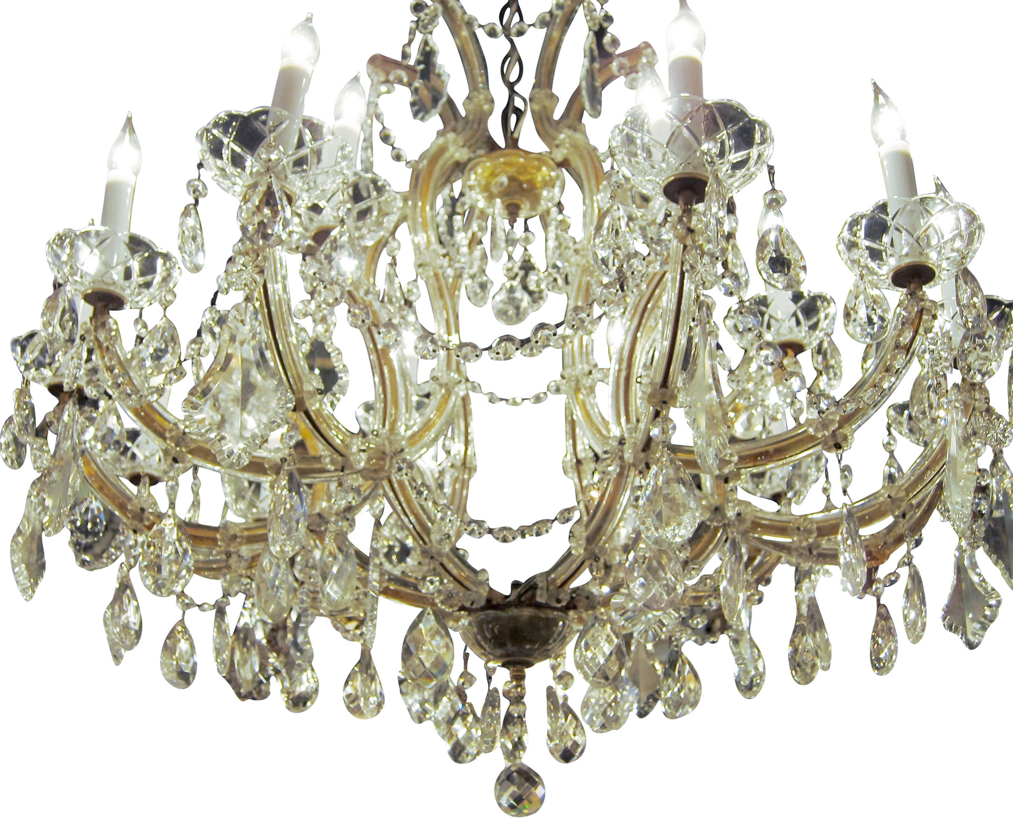 1940s Marie Therese style large crystal chandelier with 18 lights. This can be seen at our 2420 Broadway location on the upper west side in Manhattan.