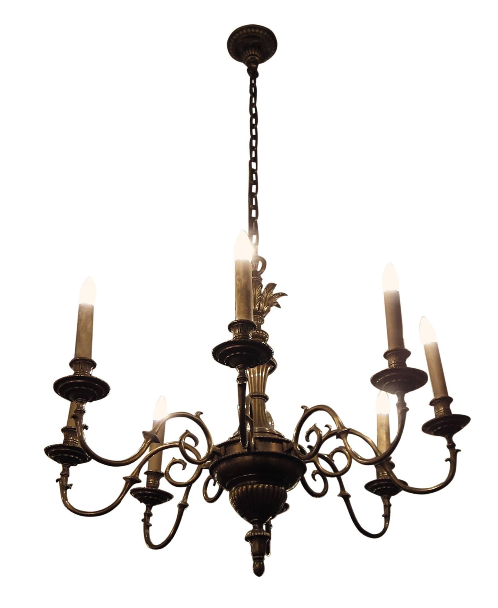 Antique eight arm French style chandelier with a wonderful patina. Made of bronze with an antique finish. Price includes restoration. 1-2 weeks to process. Please specify the overall drop that is needed upon purchasing. This can be seen at our 2420