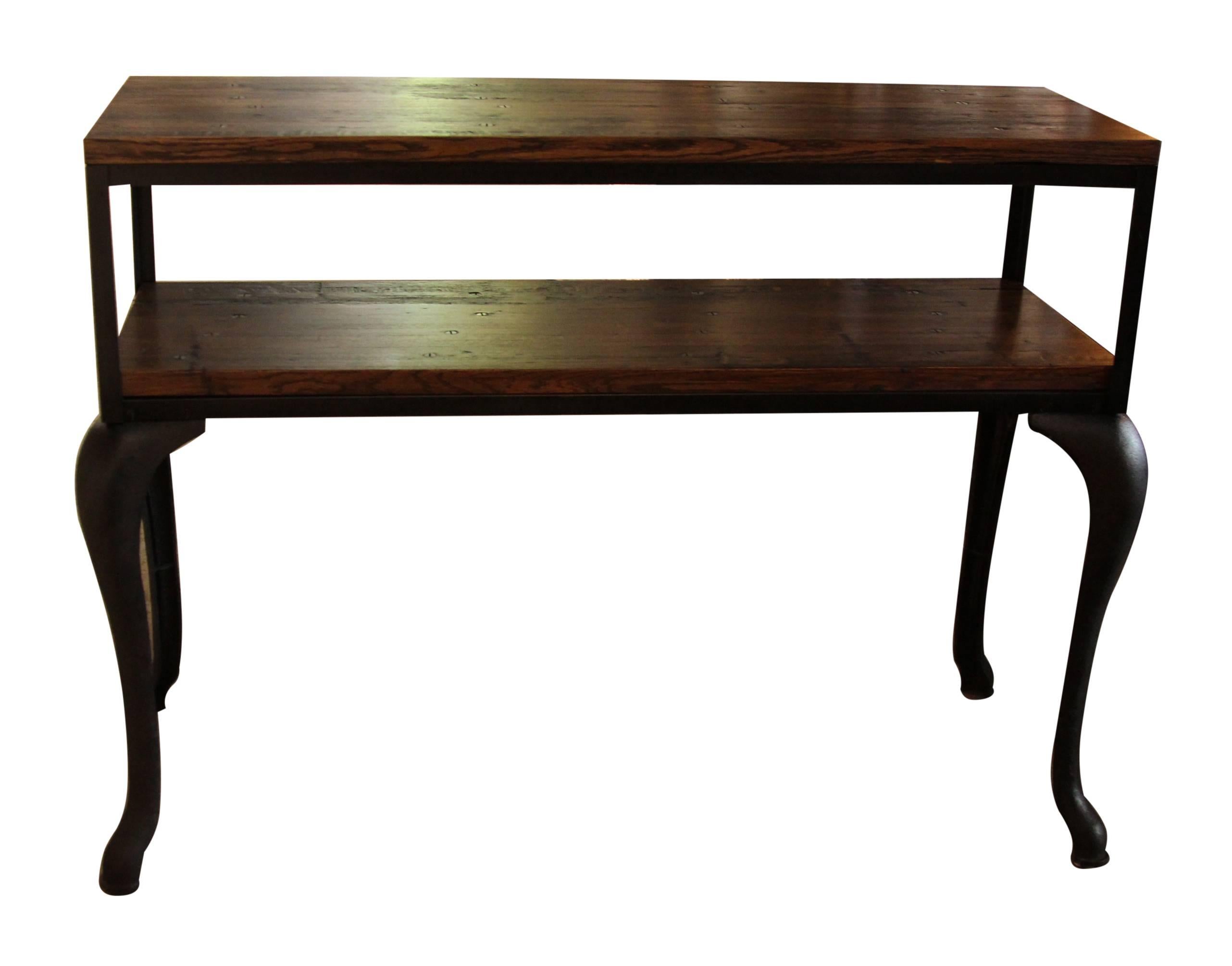 Industrial flooring top and shelf console table with cast iron cabriole legs. Any custom sizes can be made. 8-9 weeks lead time for manufacturing.
Please note since each table is custom built each table varies slightly due to the natural grain of