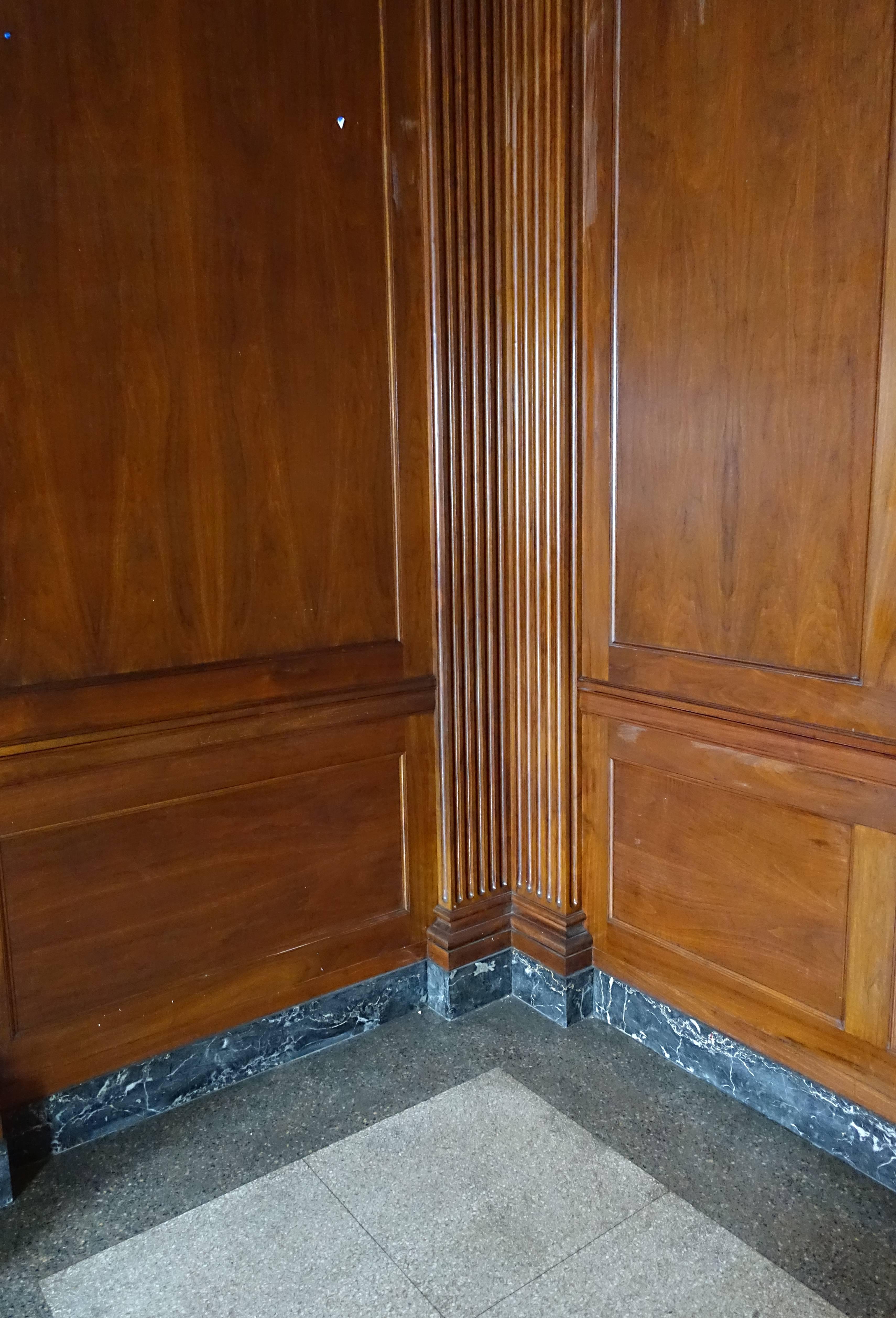 Early 20th Century Neoclassical Walnut Panelled Room and Mantel from the Williamsburg Savings Bank