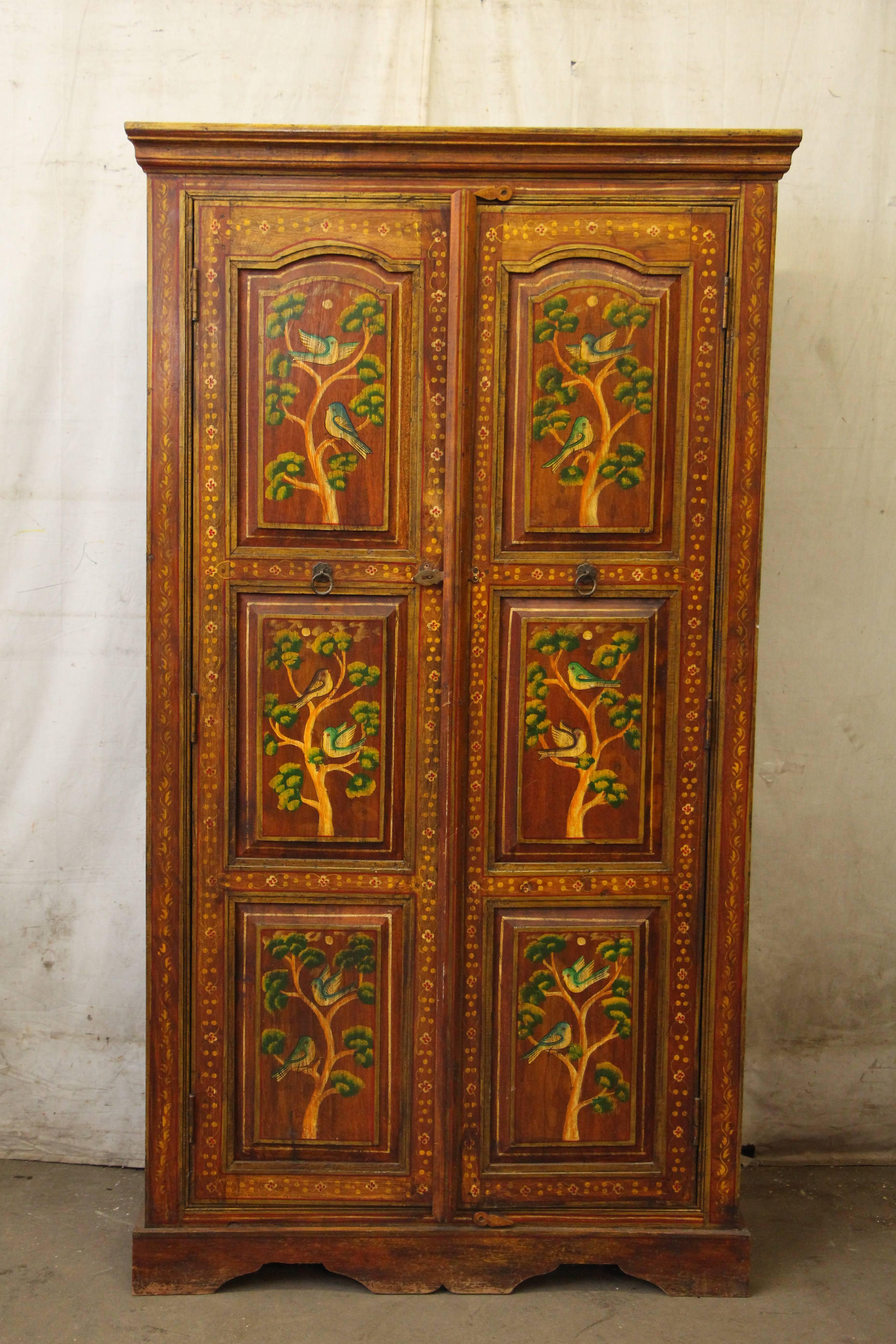 1990s hand-painted wood cabinet with three shelves. This can be seen at our 5 East 16th St Union Square location in Manhattan.