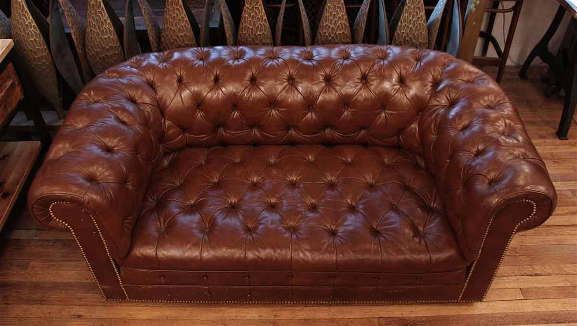 leather couch with rivets