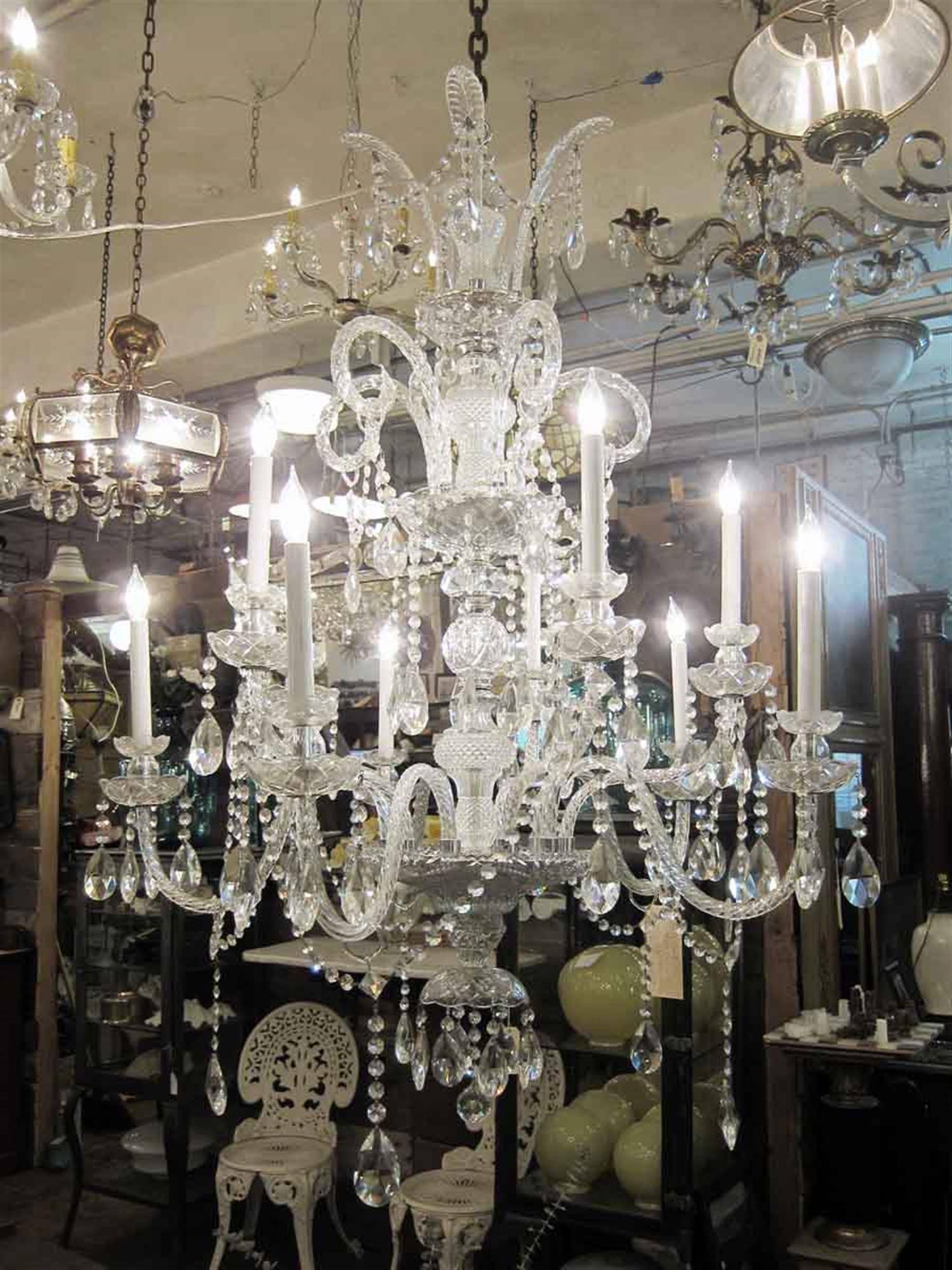 1950s, Italian nine-arm crystal chandelier with swag crystals. This chandelier has been completely refurbished. Please specify the overall drop that is needed upon purchasing. Please note, this item is located in one of our NYC locations.