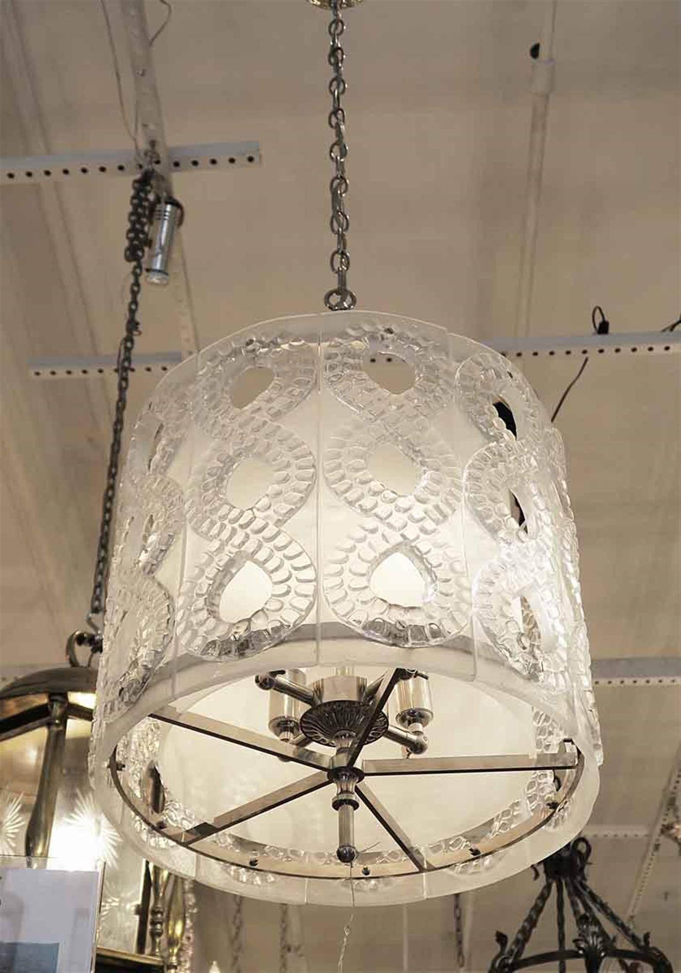 1990s molded crystal light with 11 panels, an inner frosted glass circular shade and a polished nickel frame and chain. Styled after the 1950s 