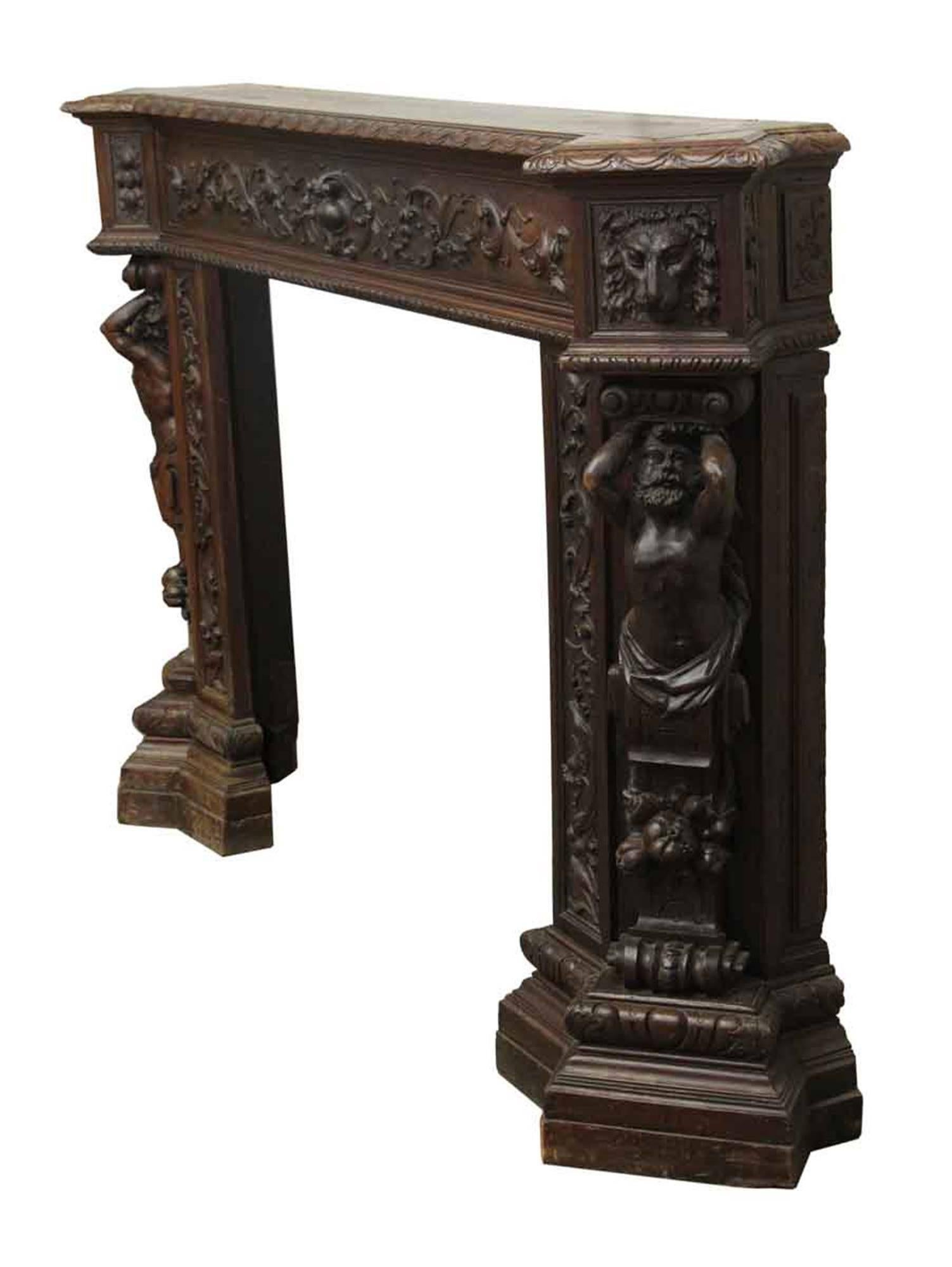 Hand carved mahogany mantel, which was one part of a room with additional hand carved architecture. Made in the early 1900s. Please note, this item is located in our Scranton, PA location.