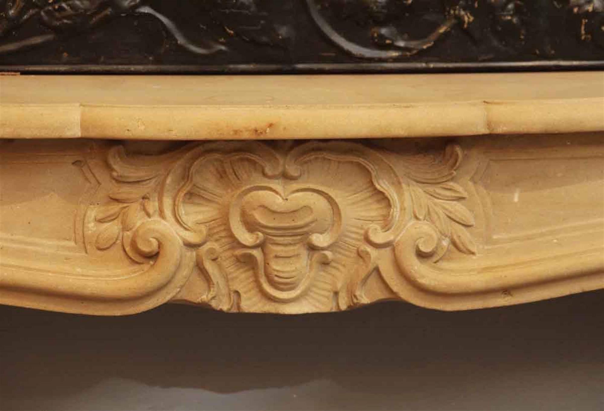 Tan Neoclassical Style Limestone Mantel with Carved Details In Excellent Condition In New York, NY