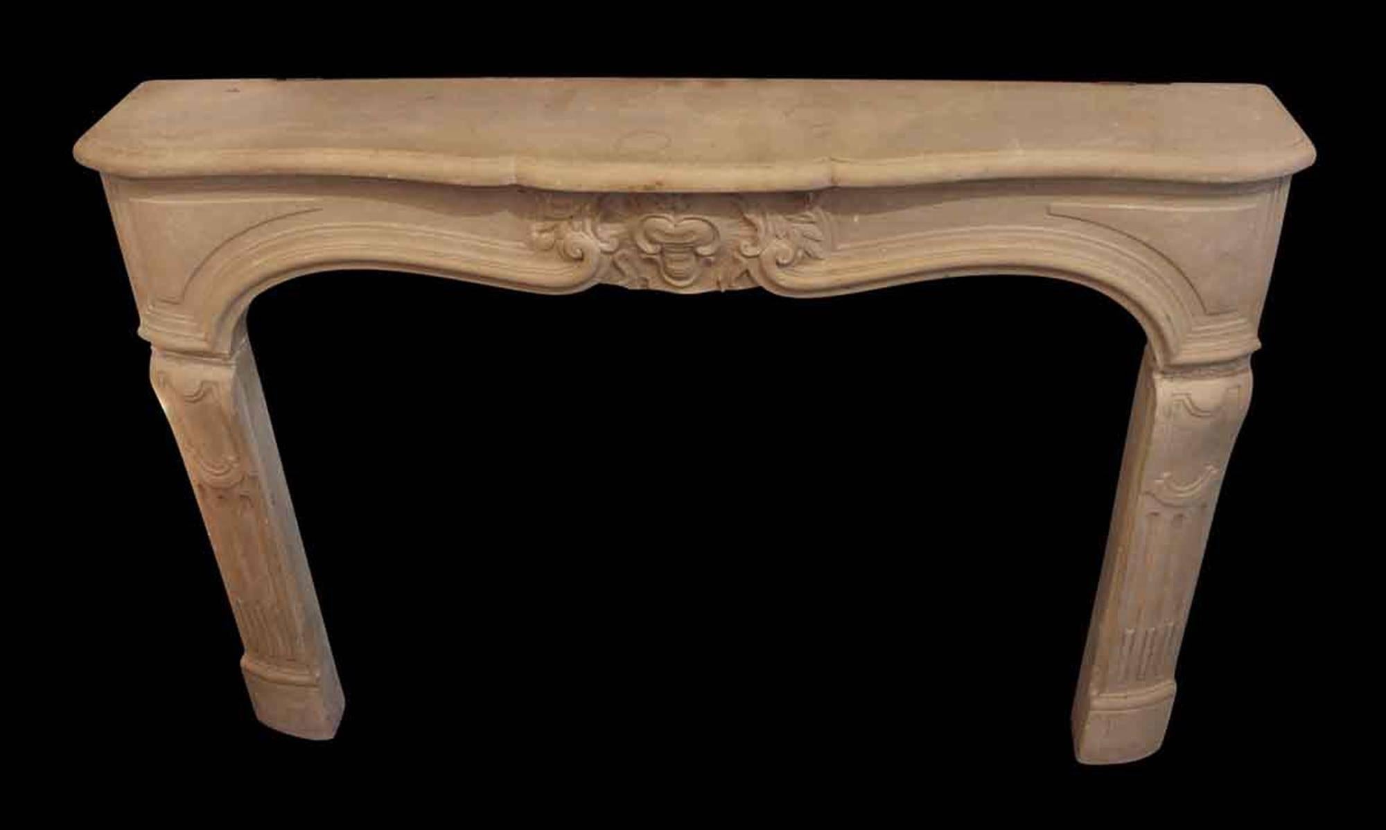 American Tan Neoclassical Style Limestone Mantel with Carved Details