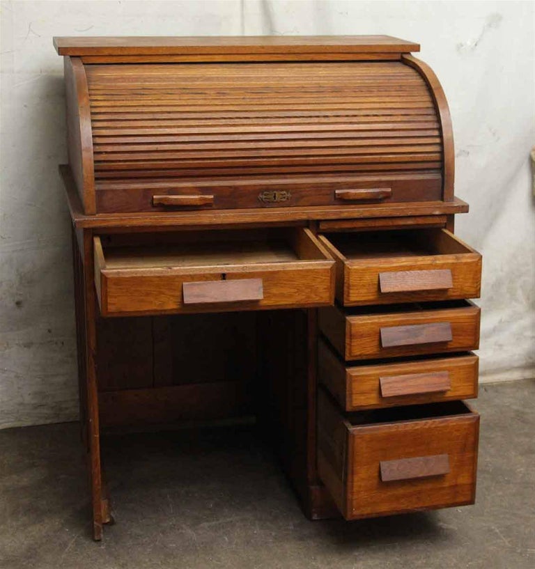 1920s Solid Oak Roll Top Desk with Recessed Panels and Five Drawers For
