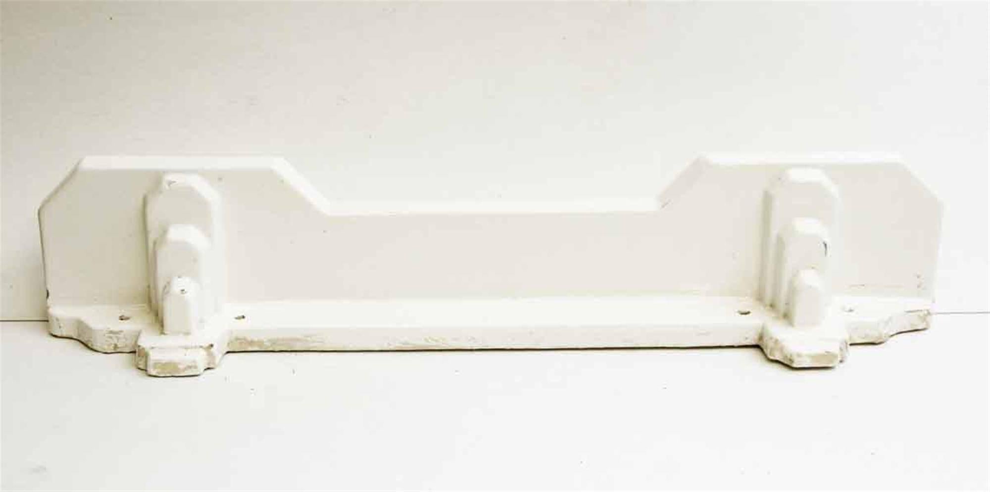 Reclaimed 1970s French ceramic Art Deco style bathroom wall shelf with a white porcelain finish. Some surface wear from age. This can be seen at our 400 Gilligan St location in Scranton, PA.