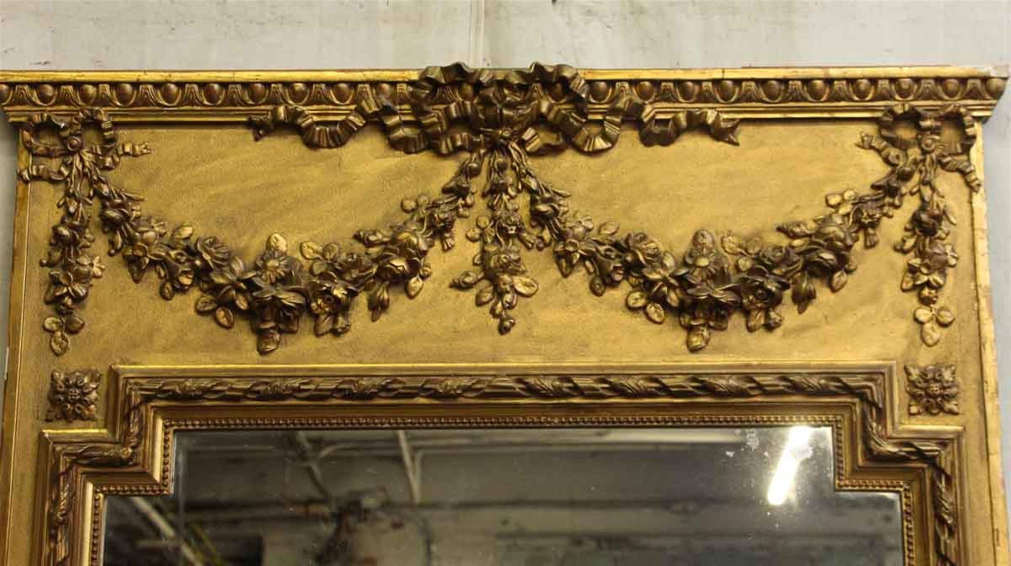 1880s Antique Tall Gilded French Mantle Mirror with Beaded Floral Swag Detail In Excellent Condition In New York, NY