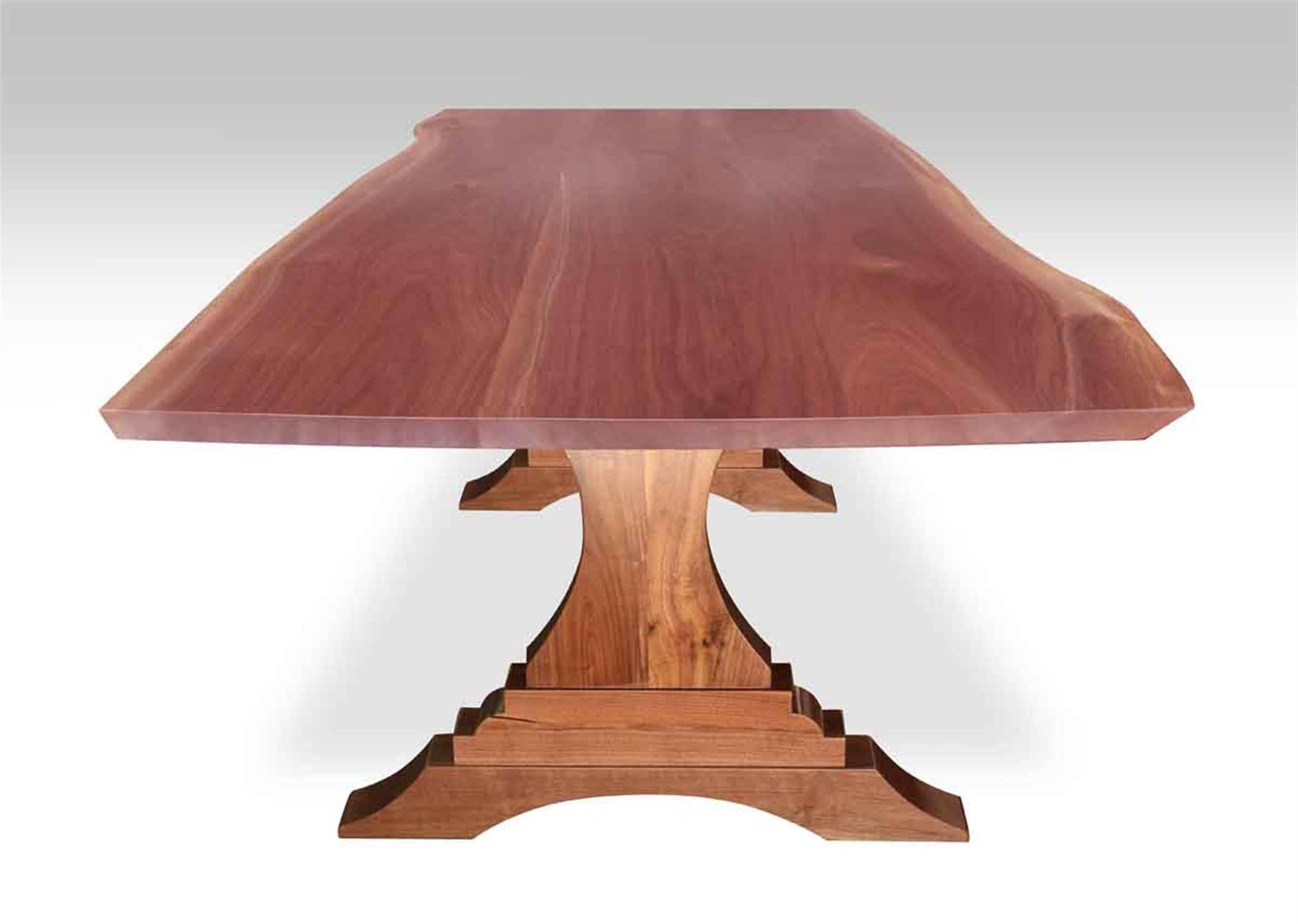 Custom made out of solid walnut with smoothed natural tree trunk edges. Lacquer finish or oil finish available. Please note since each table is custom built, each table varies slightly due to the natural grain of the wood in look and shape.