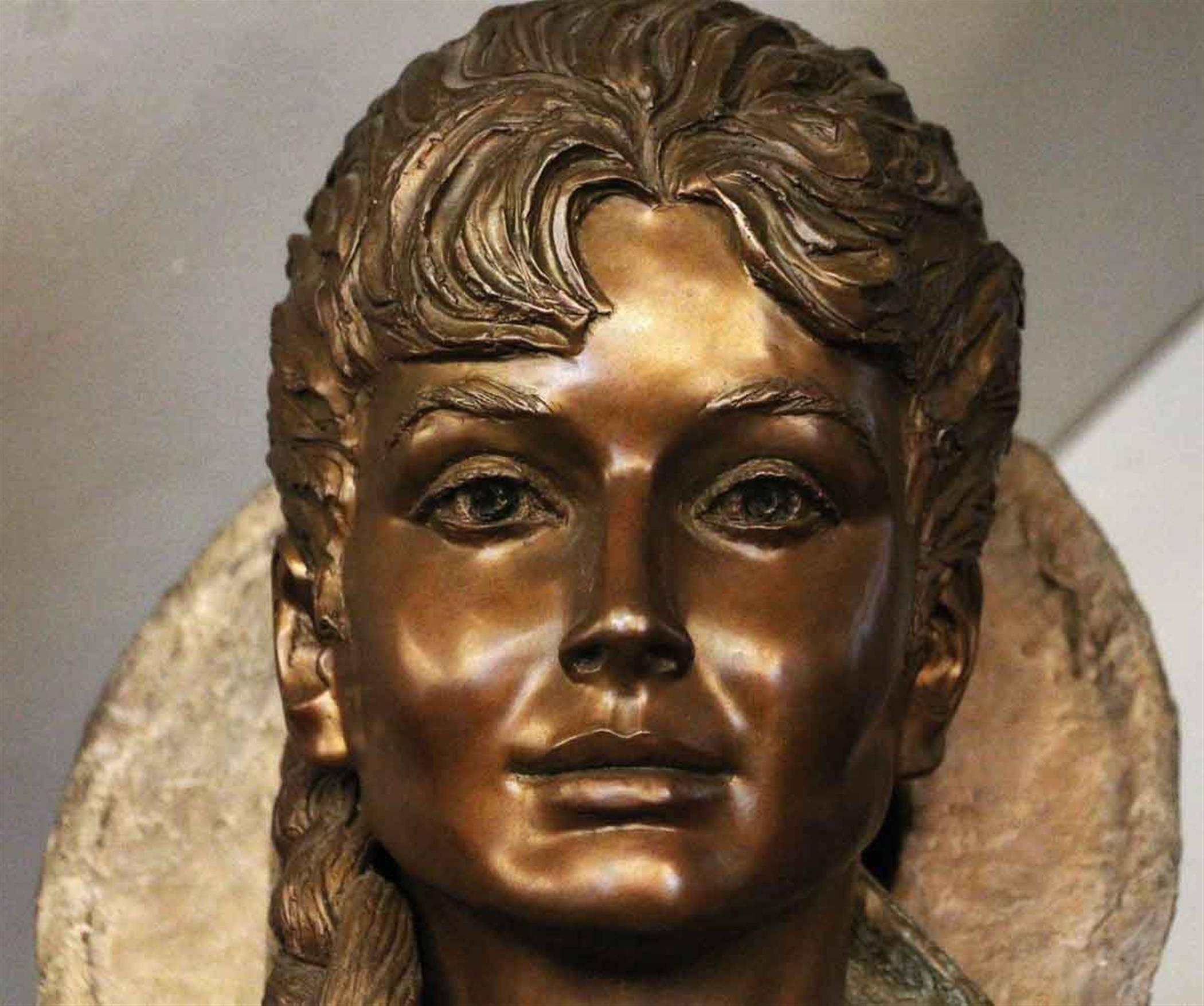 Contemporary bronze sculpture on a white marble base. Sun Dance won the A.A.P.L. Grand National 1998 Sculpture George Gach Memorial Award. Signed by artist Peggy Mach. Numbered 1/25. This can be seen at our 2420 Broadway location on the upper west