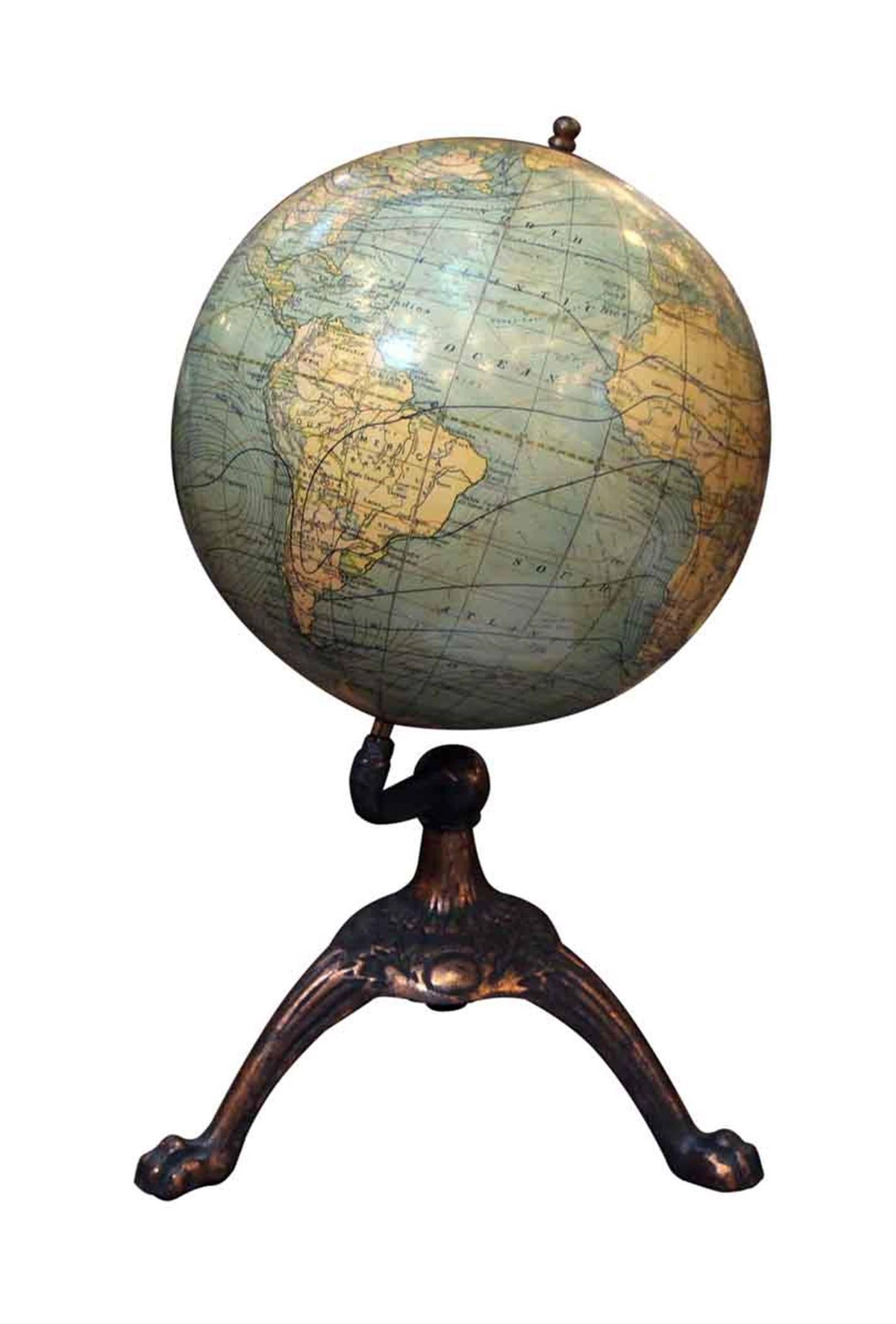 1920s C.S. Hammond & Co., New York. Measure: 8 inch table top New Terrestrial globe. Dull paper gores over plaster, time dial at North Pole. Oceans finished in olive green with ocean currents, isothermal lines, trade winds and analemma. Offset