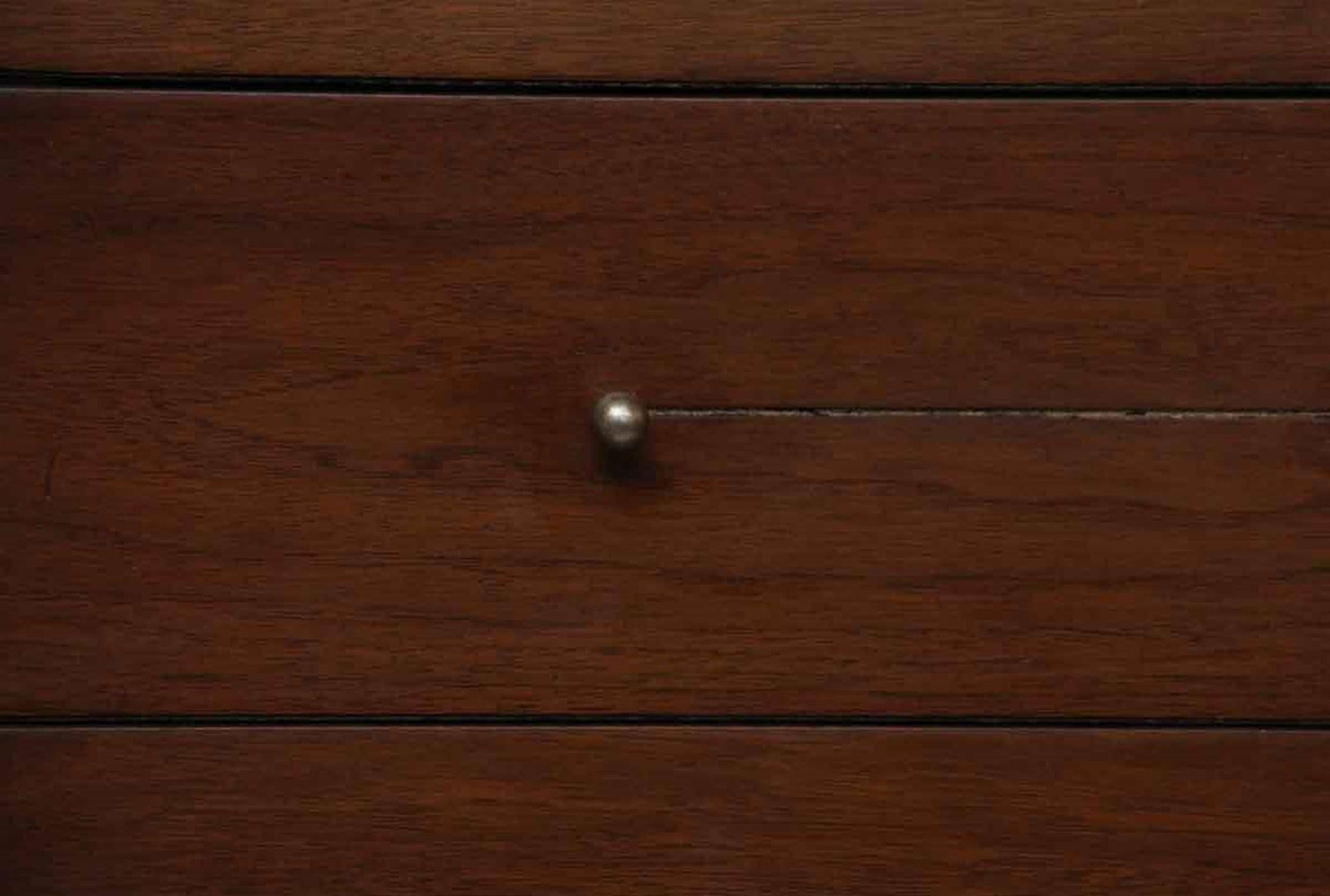 Dark wood tone refinished six-drawer walnut dresser with small nickel drawer pulls. Minor scratches on back top right corner, please see photo. This can be seen at our 302 Bowery location in Manhattan.