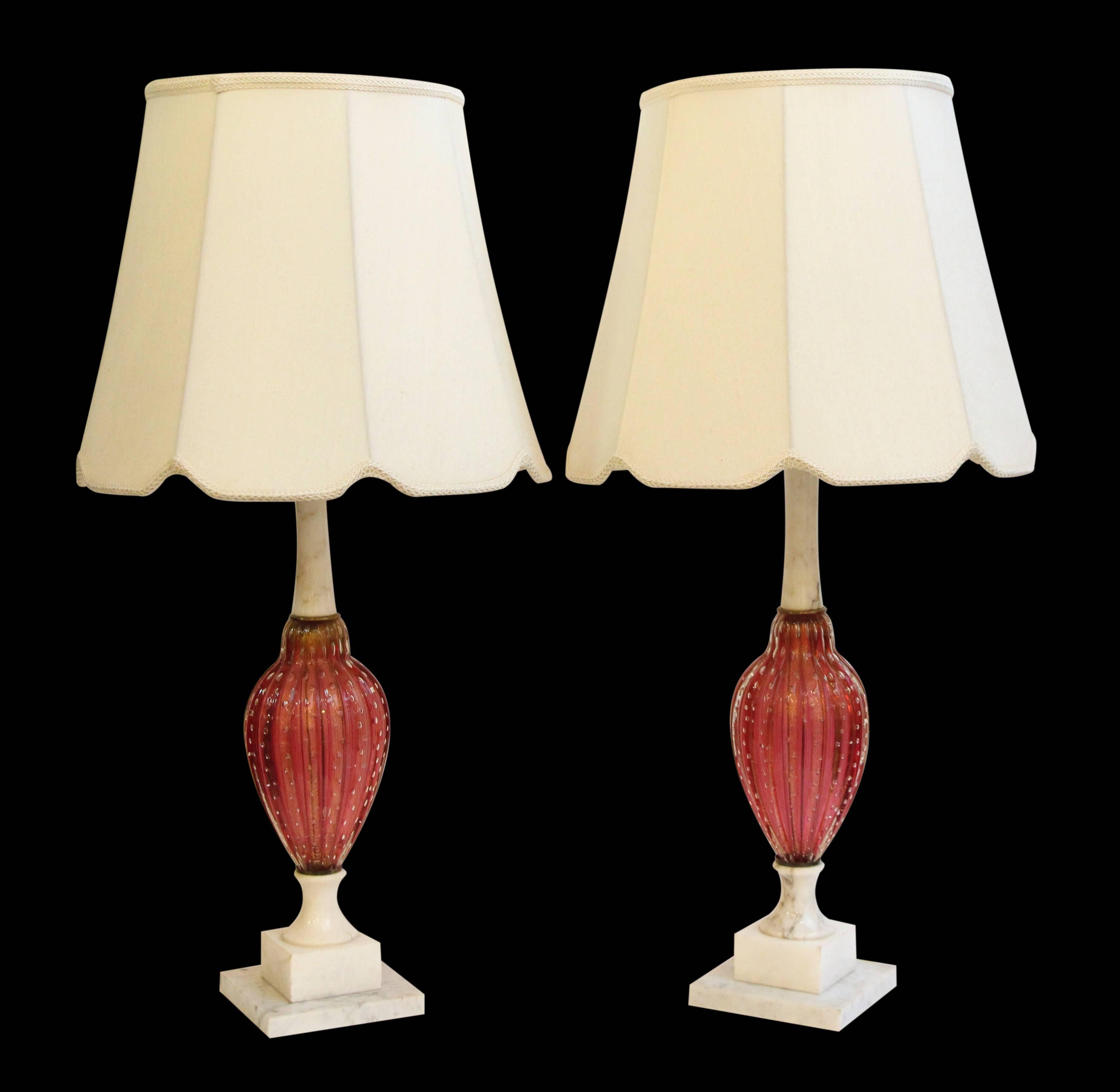 Pair of table lamps fashioned from pink Murano glass and alabaster mounts, circa 1940. This item can be viewed at our 5 East 16th St, Union Square location in Manhattan.