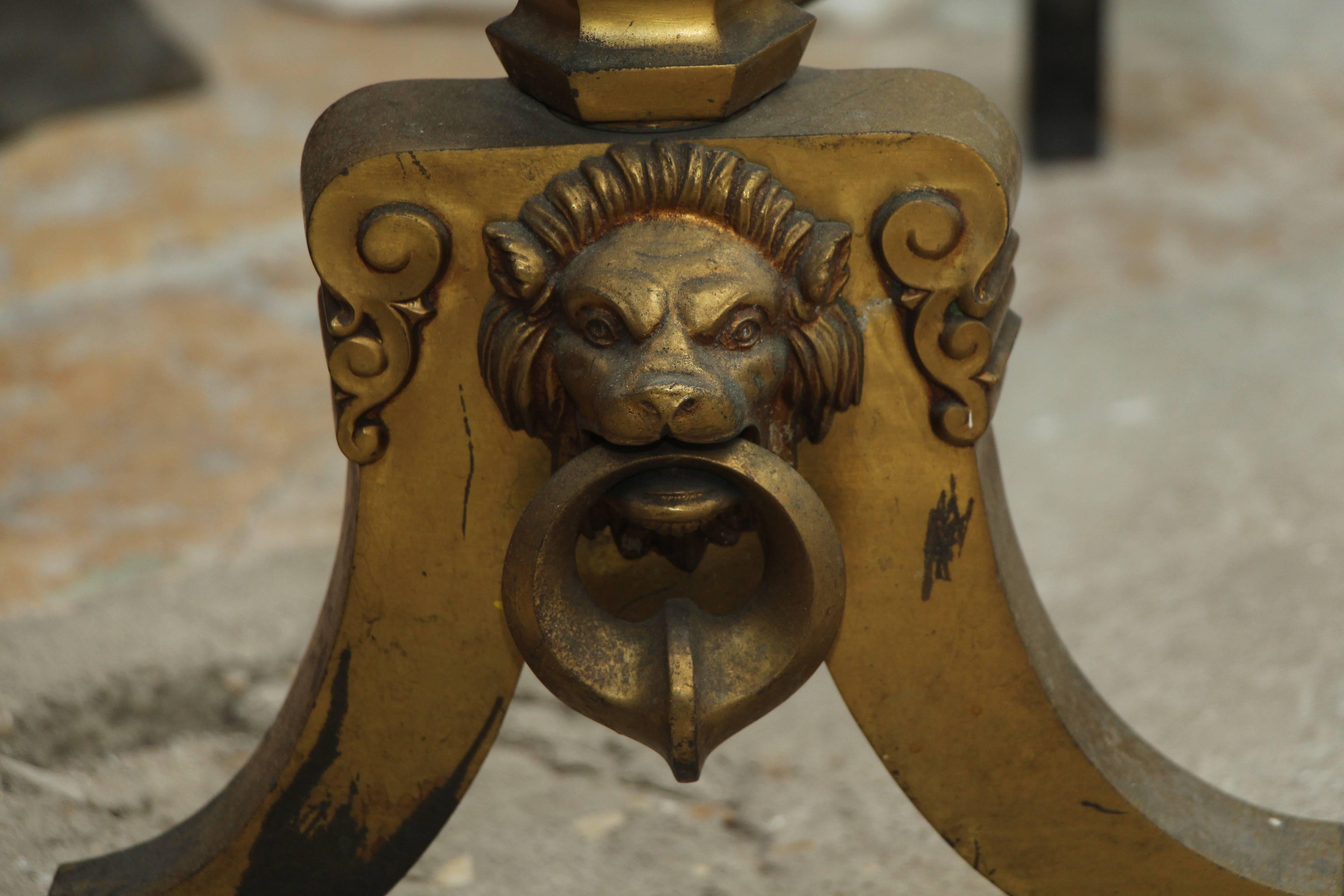 1920s Pair of Gilded French Figural Ornate Bronze Lion Head and Shield Andirons 1